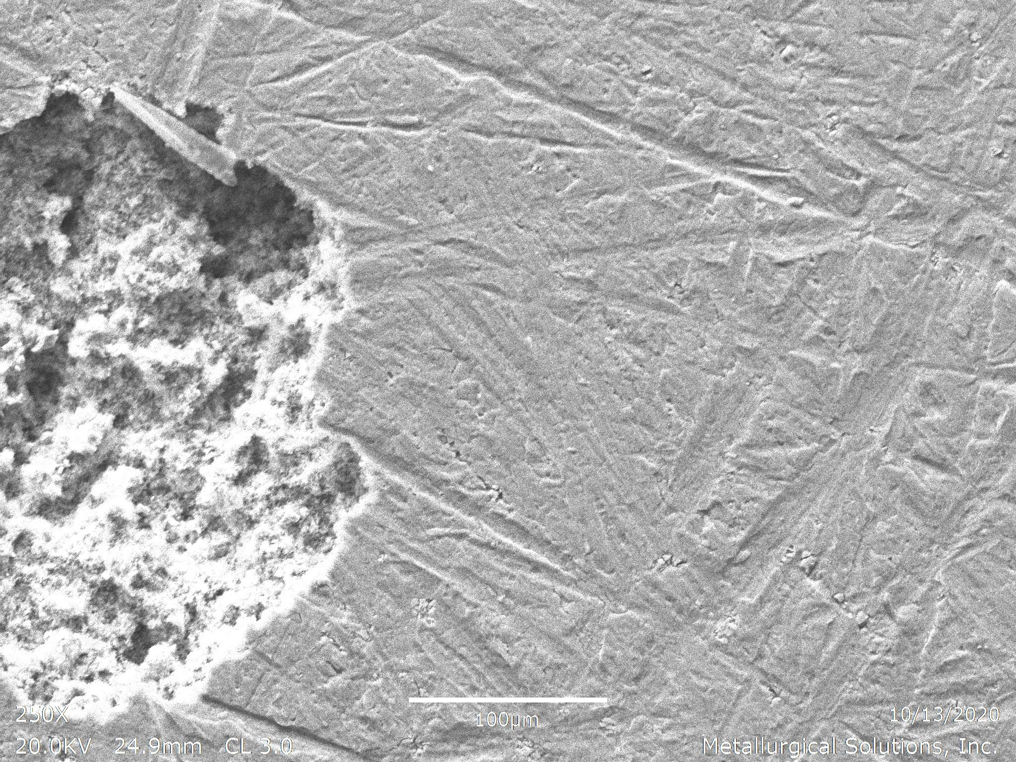 Localized pitting corrosion SEI 250x, scanning electron microscope secondary electron imaging evaluation identifying cavernous pitting degradation, porous corrosion product accumulation, and acicular microstructural phase morphology per ASTM G46 and 