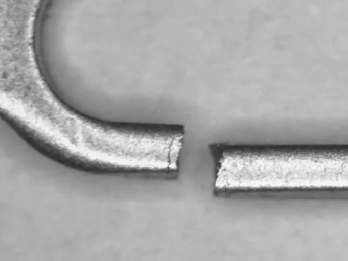 Visual inspection of passivated stainless steel and titanium orthopedic implants to confirm zero surface defects and verify medical component manufacturing cleanliness compliance.