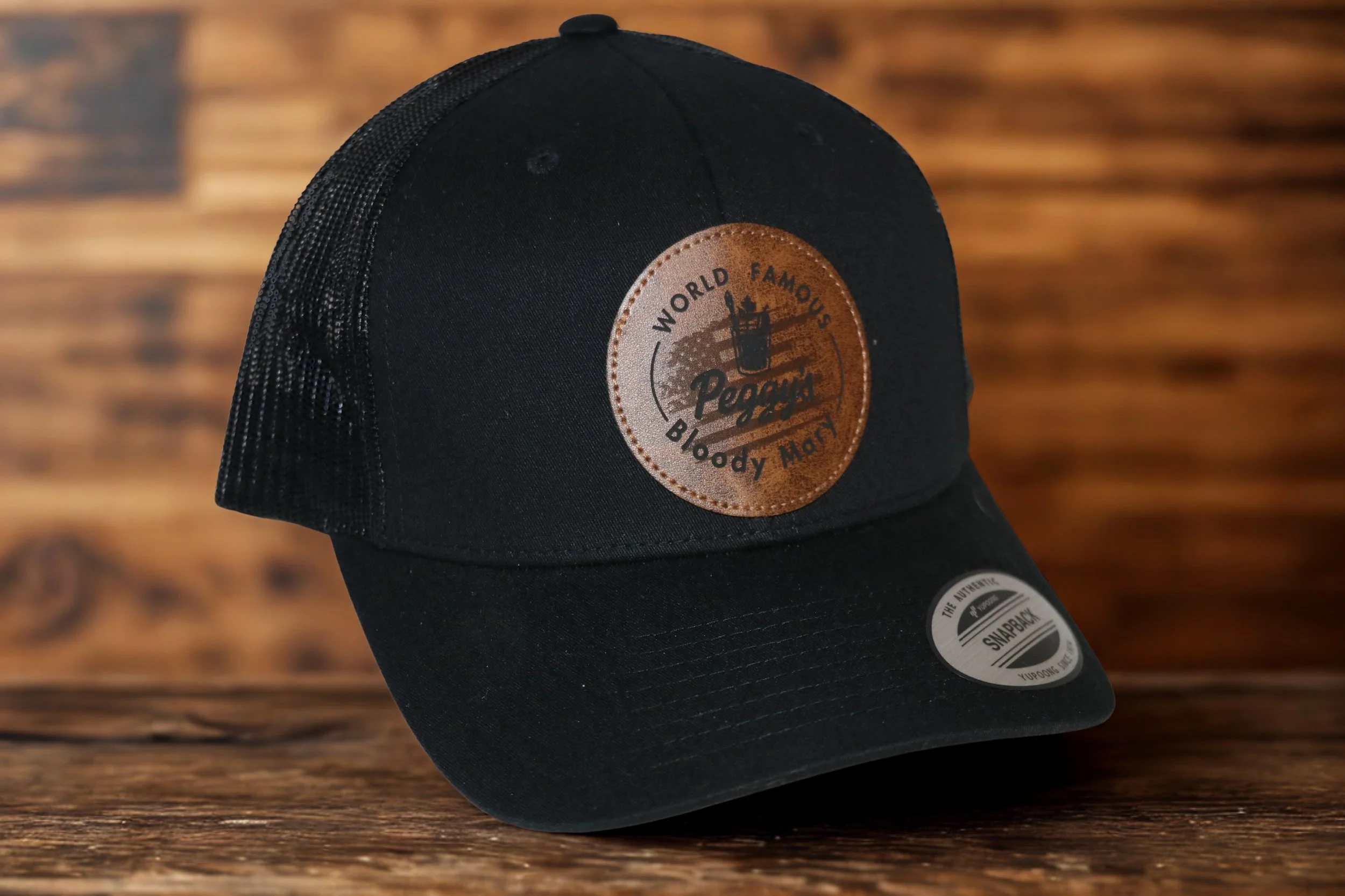 Peggy’s World Famous™ Bloody Mary Classic Trucker Hat – black/black