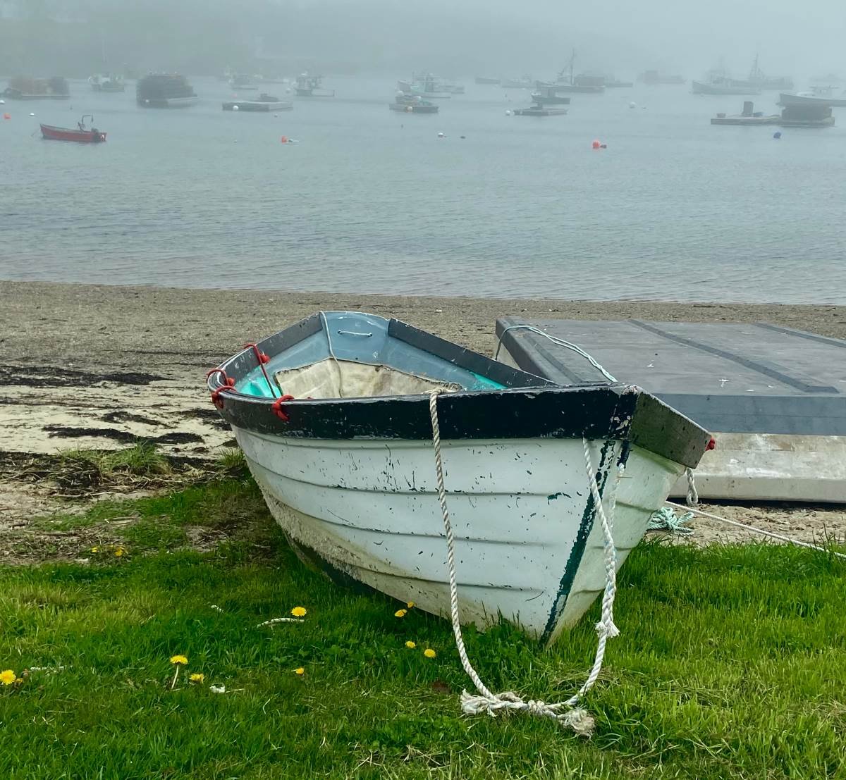 The fog rolling in, while a lone boat waits for clear weather, Orris Island, ME