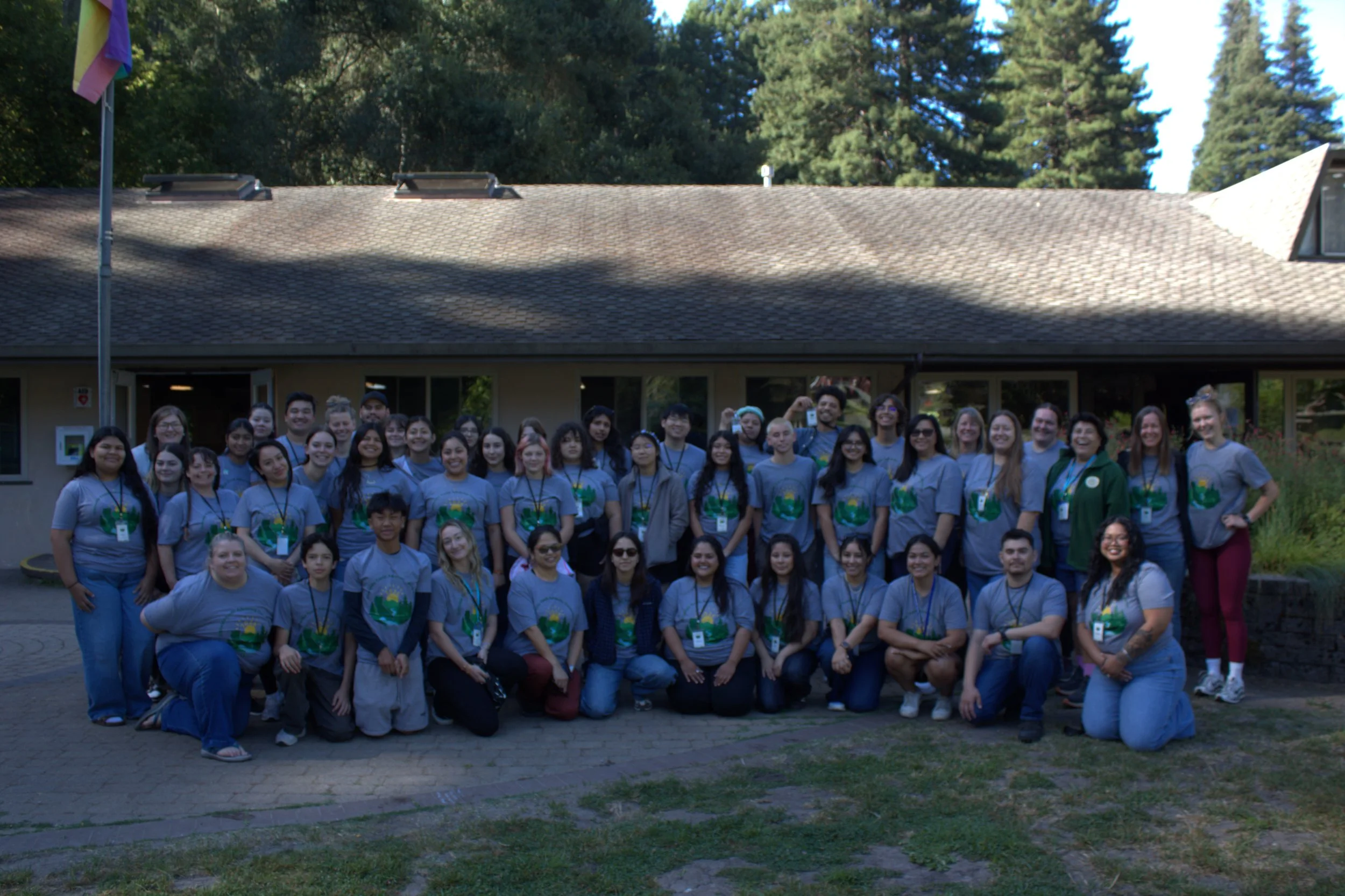 Group image of Statewide Youth Advocacy Conference attendees outside the dining hall.