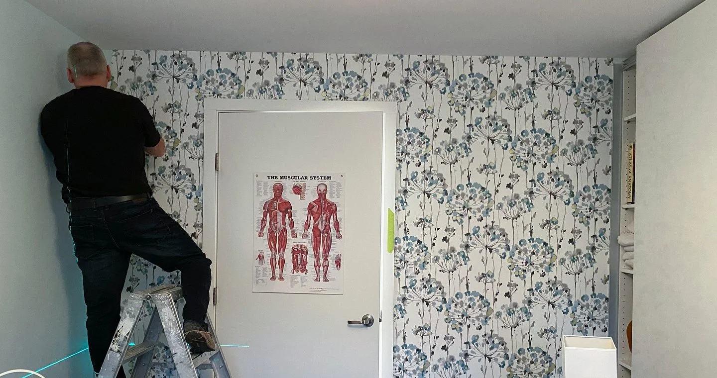 room with patterned wallpaper. Based in Penticton BC