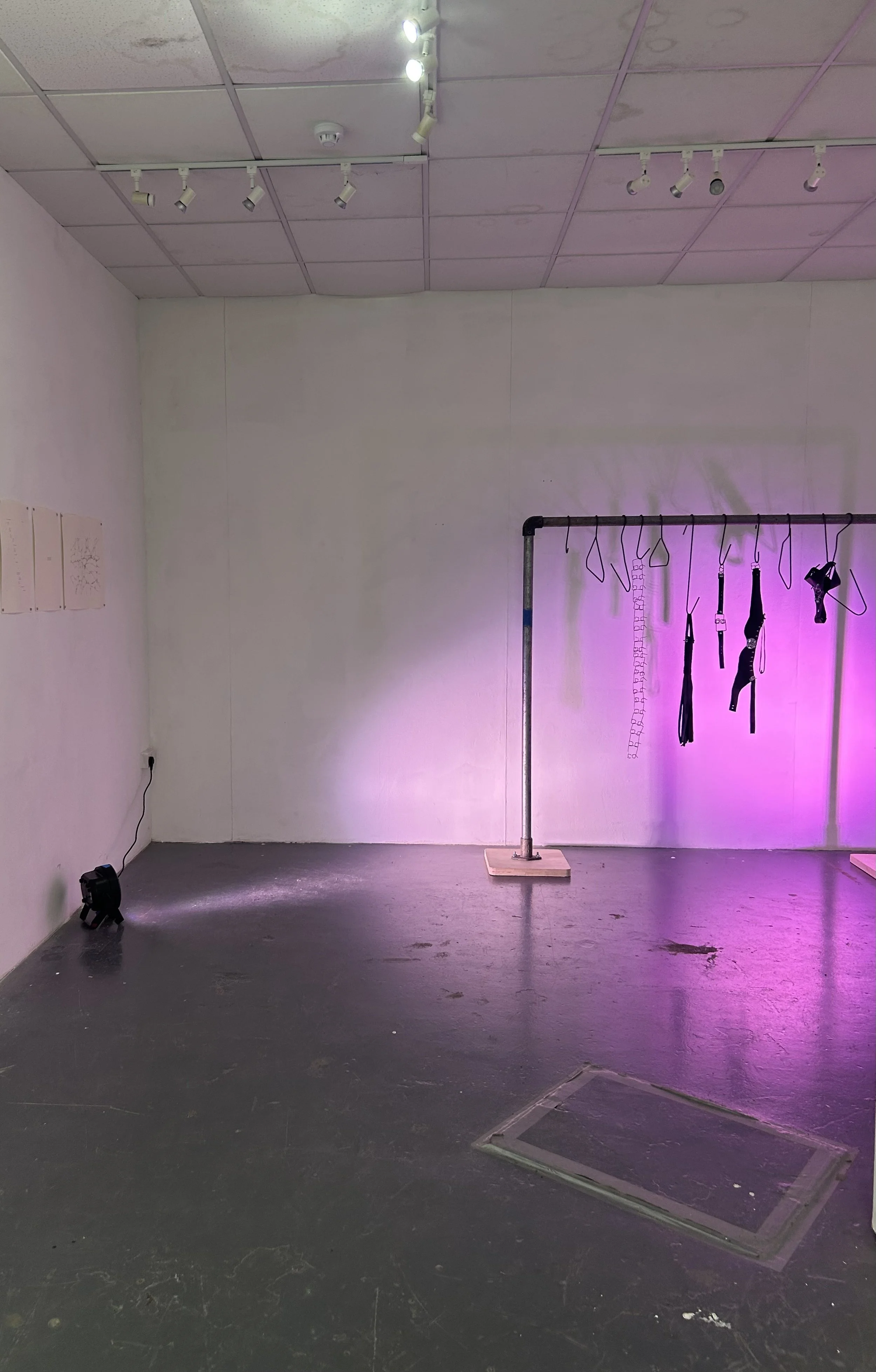 Berlin cloakroom, 2024,  sculpture installation, scaffolding and leather garments, 182 x 240 cm. 