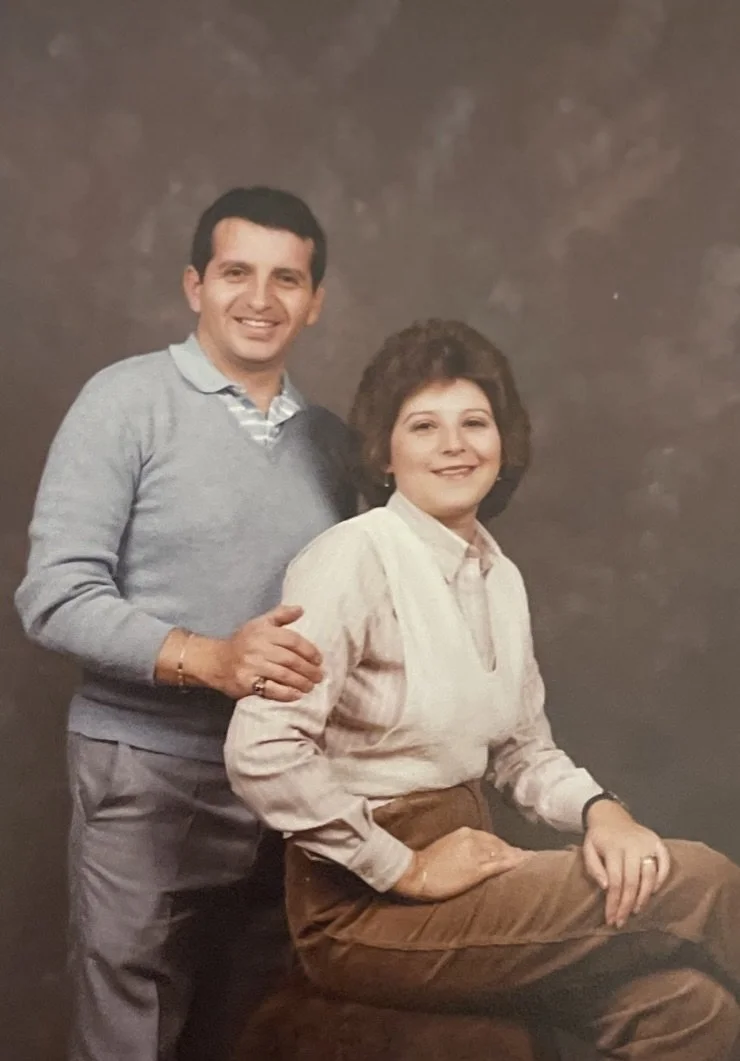 Young Mr. and Mrs. Maldonado, posing for family pictures