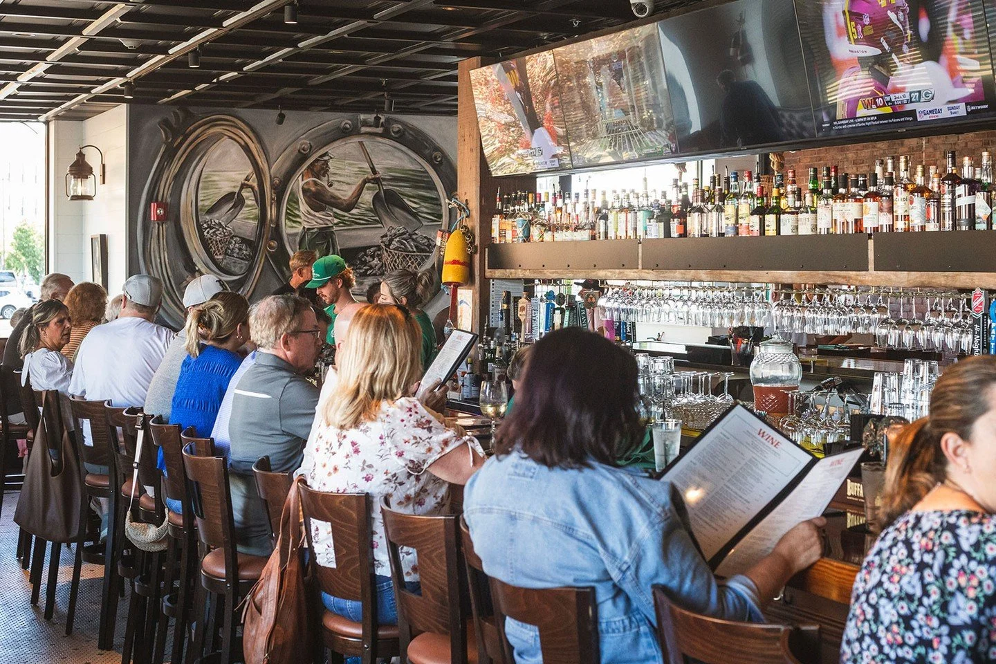 Cozy on up for oysters, pizza, wings, lobster rolls and some of the best cocktails and wine in town. The GIO bar is made for nights like this.