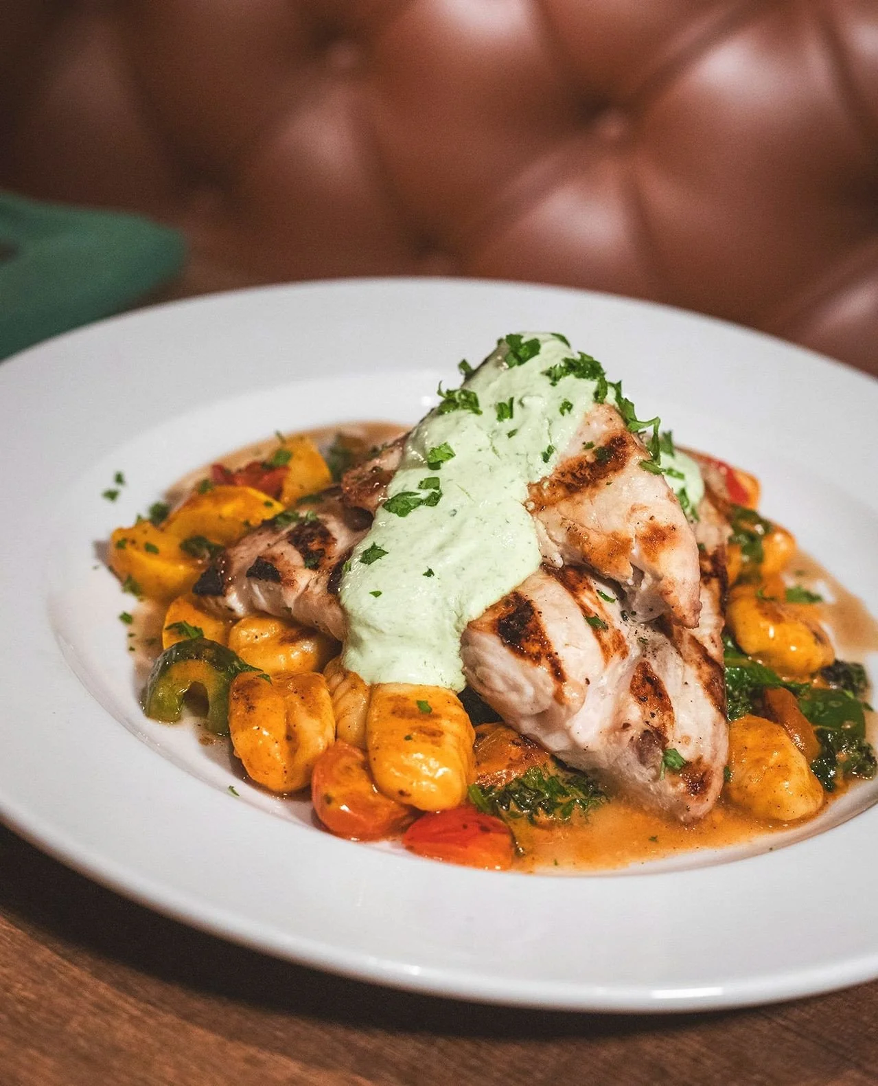 Chef's weekly specials are NOT to be slept on. Seriously, look at this dish. Mahi over gnocchi. Gluten-free. That sauce. Get it tonight, and all weekend, while it lasts!⁠
⁠
Grilled Mahi Mahi over a saut&eacute; of potato gnocchi, zucchini, cherry tom