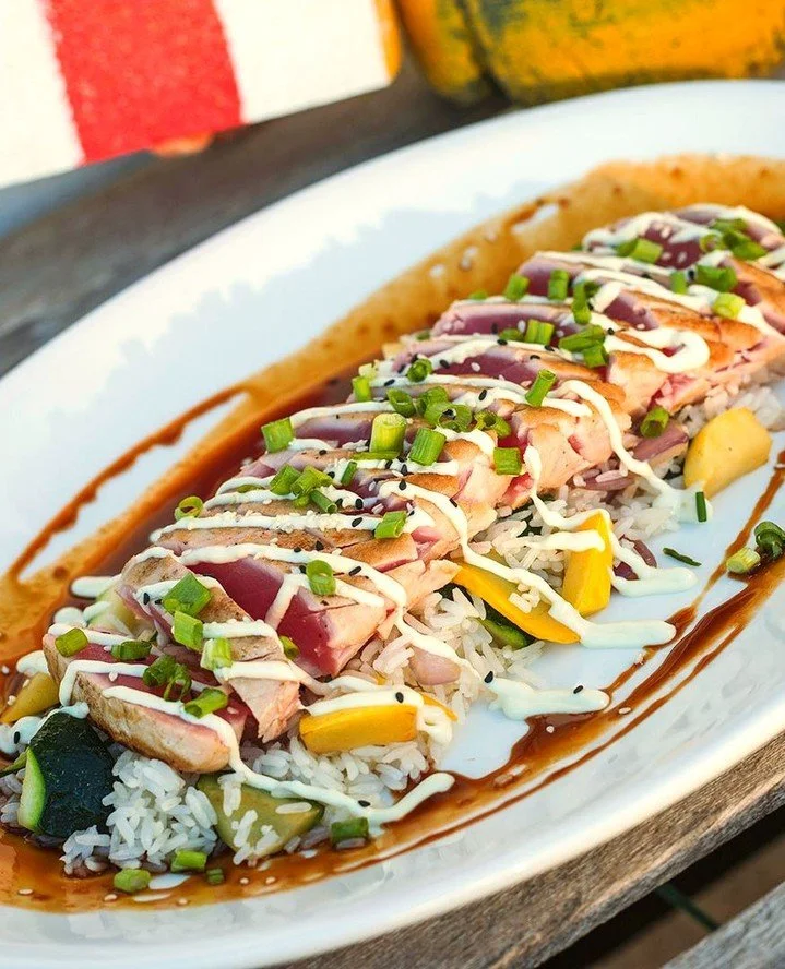 Holy mackerel, that's a lot of tuna 😲⁠
⁠
Yellowfin Tuna seared rare and served with jasmine rice, vegetables, hoisin soy sauce, and ginger scallion aioli.⁠
⁠
Yours tonight at GIO!⁠
⁠