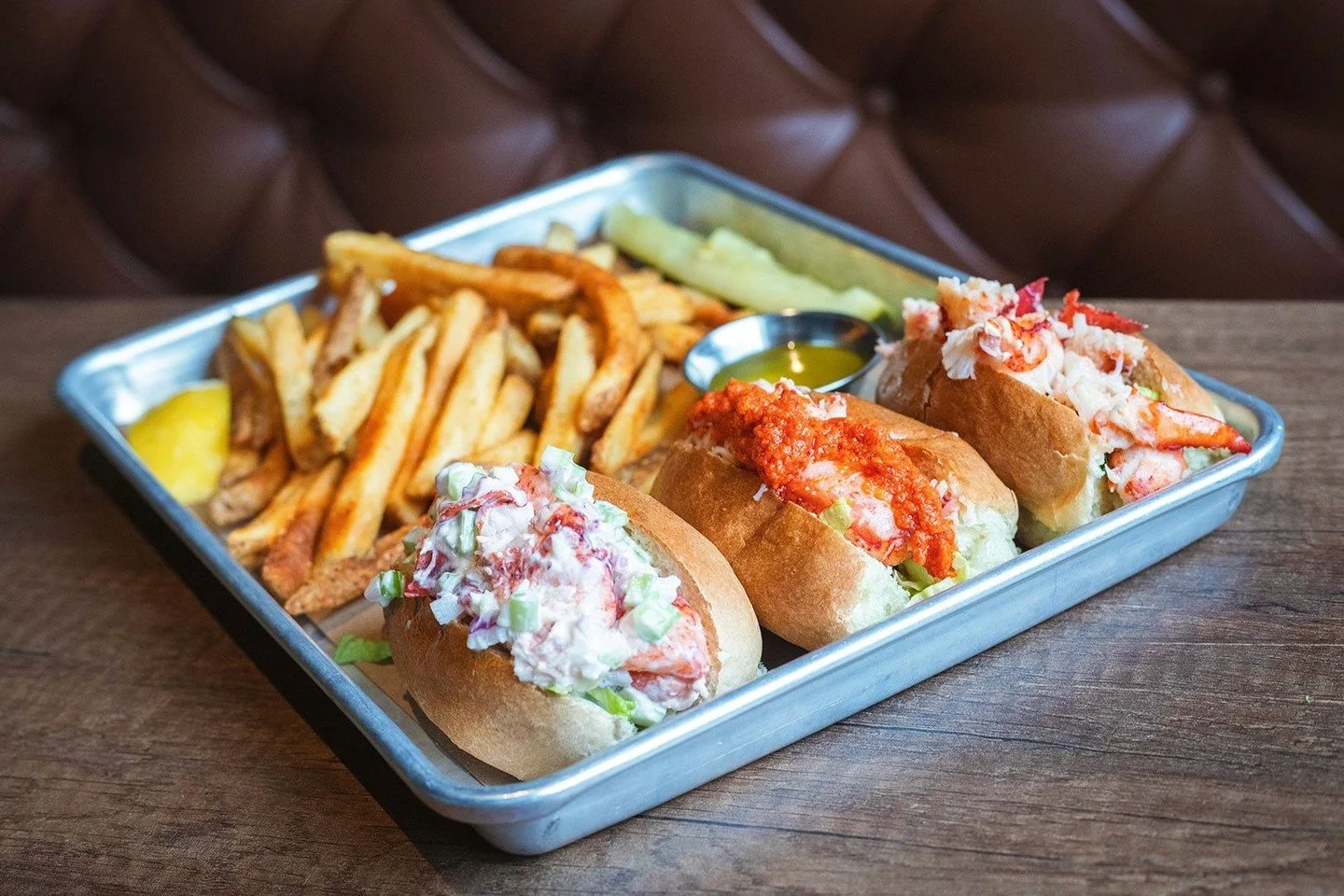 Three ways to do lobster, one very good reason to stop by. 🦞⁠
⁠
Our Lobster &lsquo;Mini&rsquo; Roll Trio is back: crisp lettuce with classic lobster salad, warm buttered lobster, and a chef&rsquo;s daily creation that keeps things interesting. Why p
