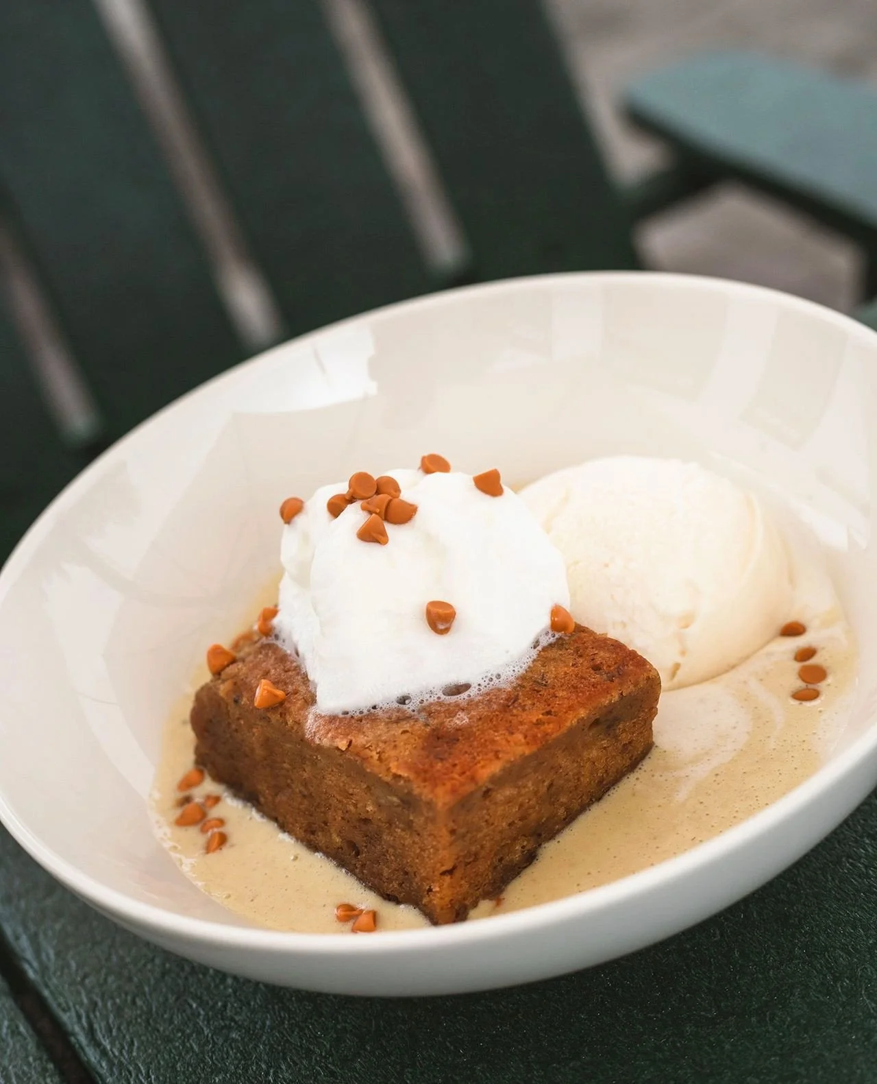 End on a high note.⁠
⁠
Our Banana Sponge Cake is finished with banana cr&egrave;me anglaise, butterscotch nibs, and vanilla ice cream. ⁠
⁠
Pair it with our featured premium sipping rum, Dos Maderas Selecci&oacute;n Triple Aged Superior Reserve, for t