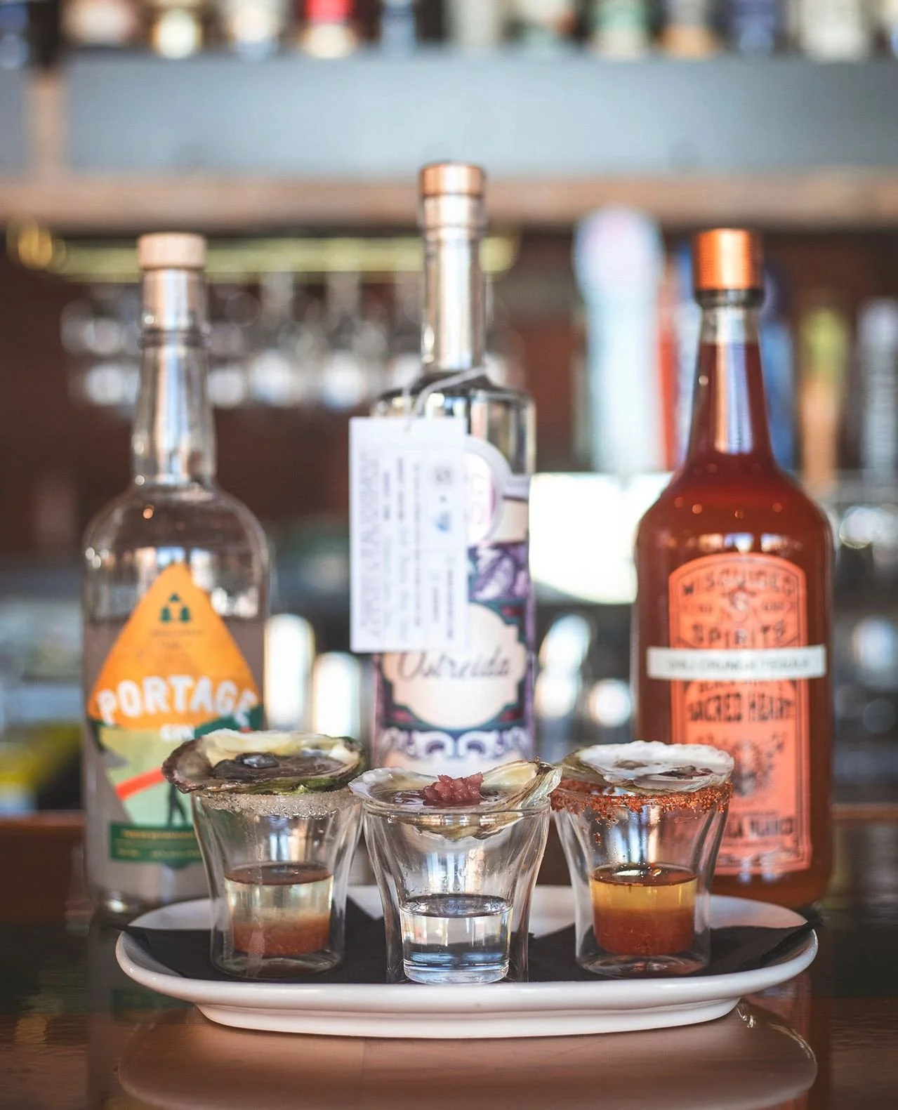 Kick off the weekend with a shot... and an oyster.⁠
⁠
Our Oyster Shooters are anything but ordinary:⁠
&bull; Vodka &mdash; ISCO Ostreida Oyster Vodka, Chef's Mignonette⁠
&bull; Gin &mdash; Moody Blue Cheese Fat-Washed Three of Strong Portage Gin, Oli