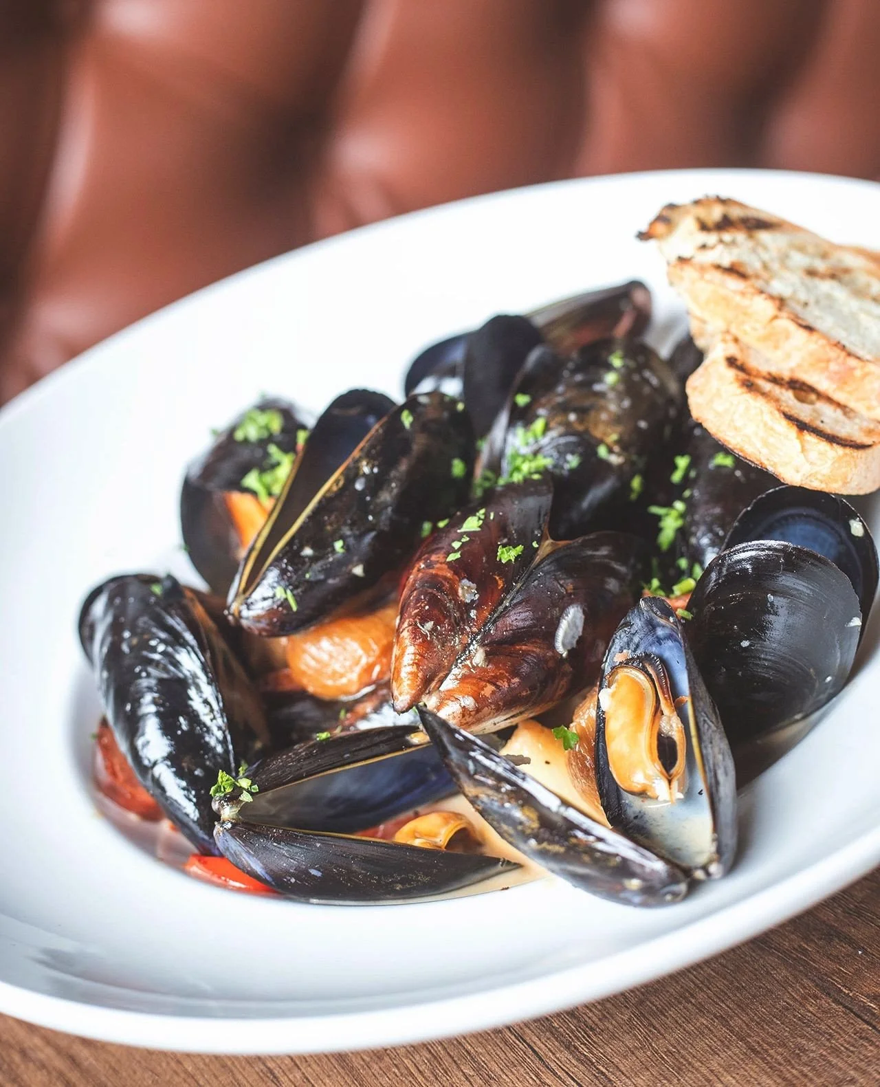 Chef&rsquo;s Lobster Trio Special brings together lemon pepper aioli, grape tomato, onion, celery, and crispy garlic, while our Saut&eacute;ed Mussels come loaded with andouille sausage, pearl onions, garlic, tomato, white wine, a splash of cream, an