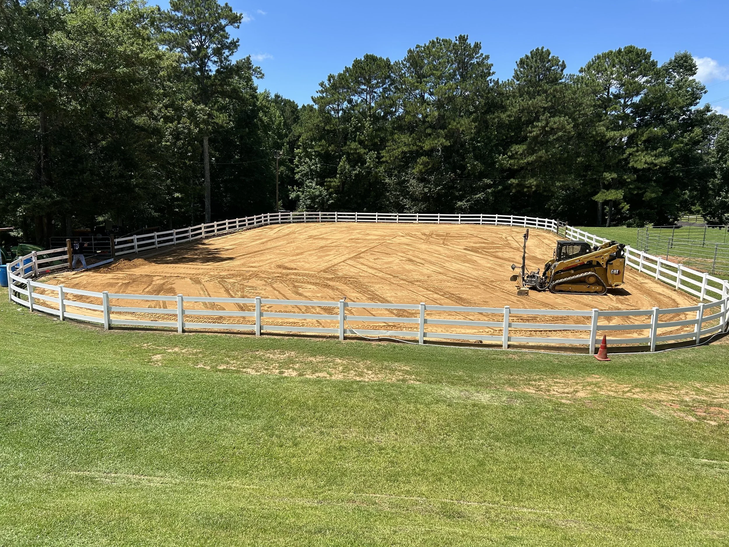 Dallas outdoor horse arena during return visit for maintenance grading and surface improvements