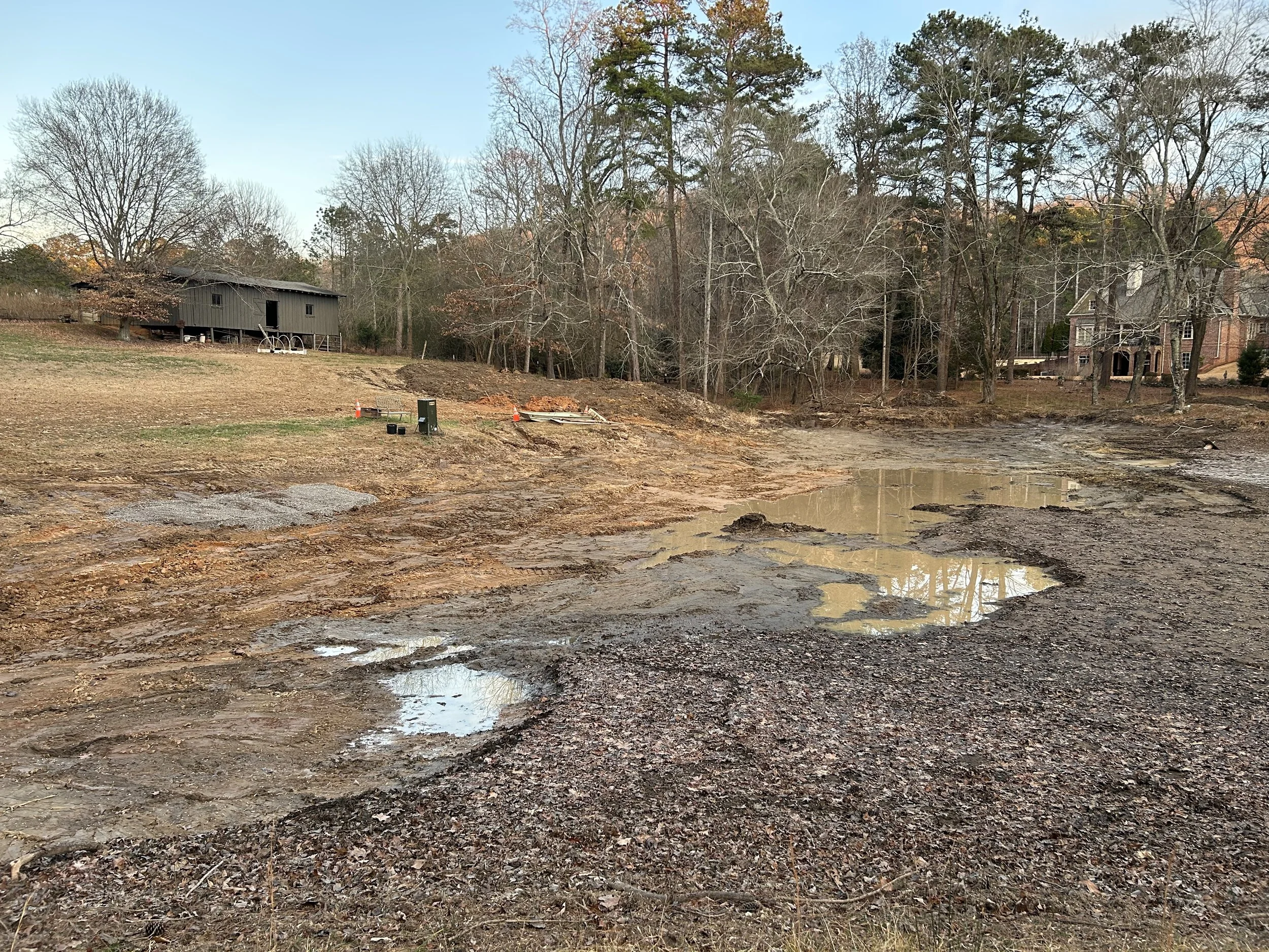 Secondary pond head section after sediment removal where runoff from the surrounding property enters the pond.