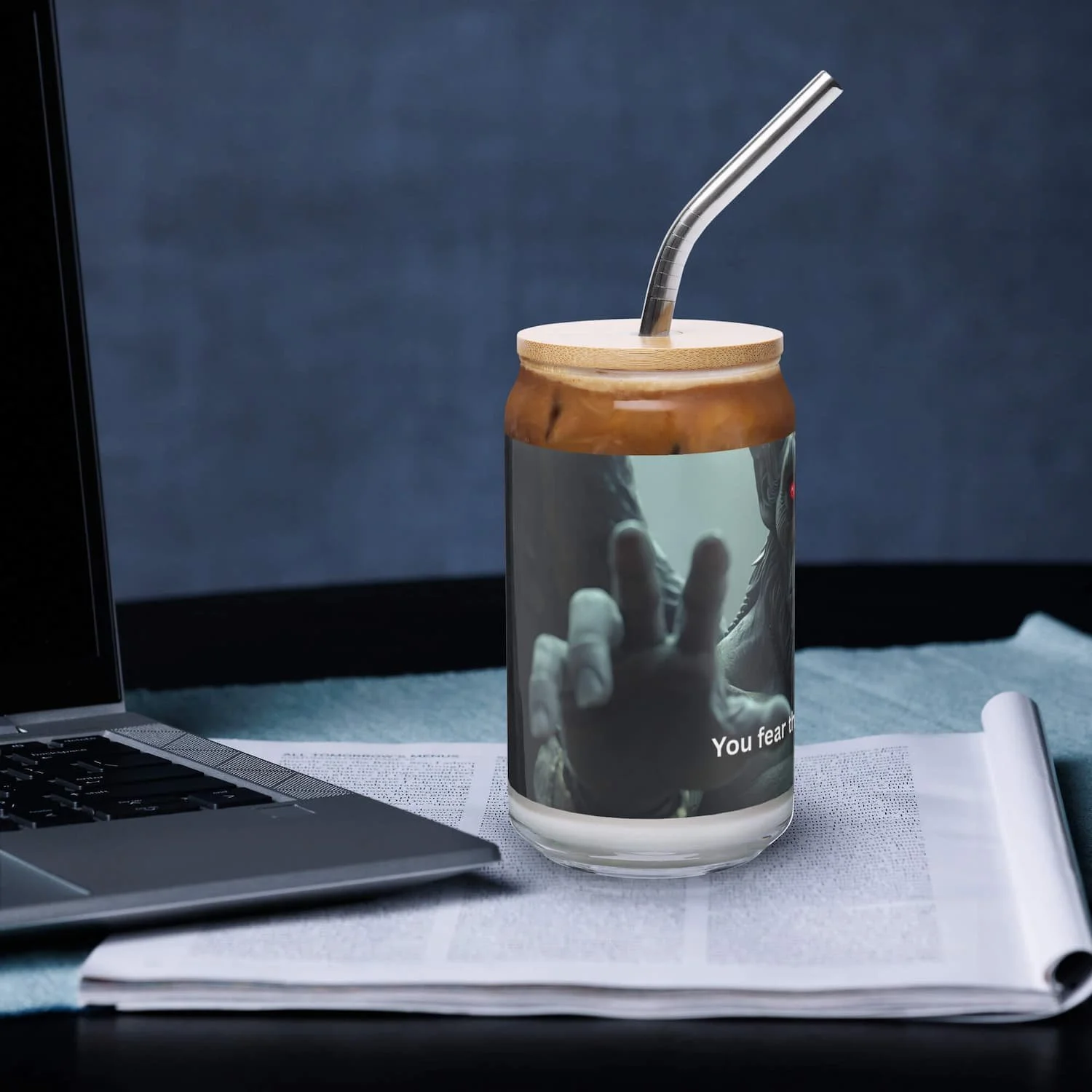 Right view of 16 oz can-shaped glass with lid and straw on a table
