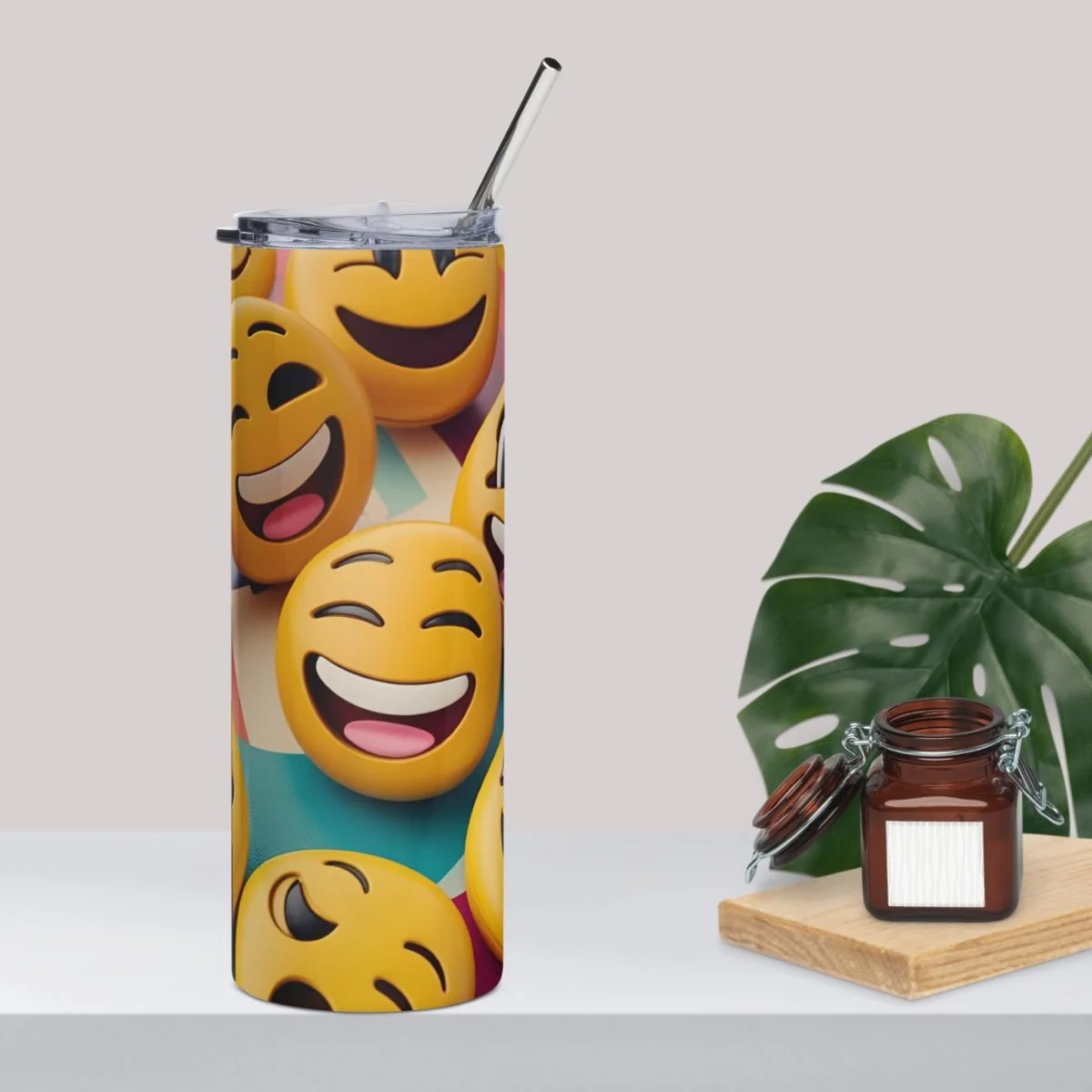 Smiley face stainless steel tumbler with lid and metal straw, bright yellow emoji design, insulated drinkware for hot and cold beverages