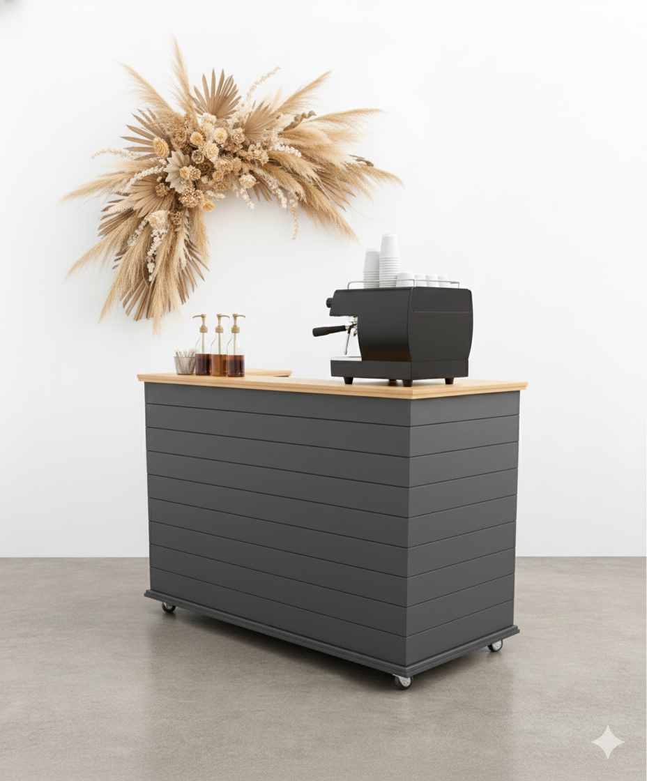 A collapsed Classic Marg event cart folded completely flat to fit inside a car boot. This tool-free collapsible bar cart demonstrates easy transport for mobile vendors and event stylists who need lightweight, portable display furniture that assembles