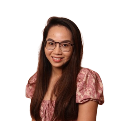 A young woman with long brown hair, wearing glasses and a pink floral blouse, smiling at the camera against a white background.