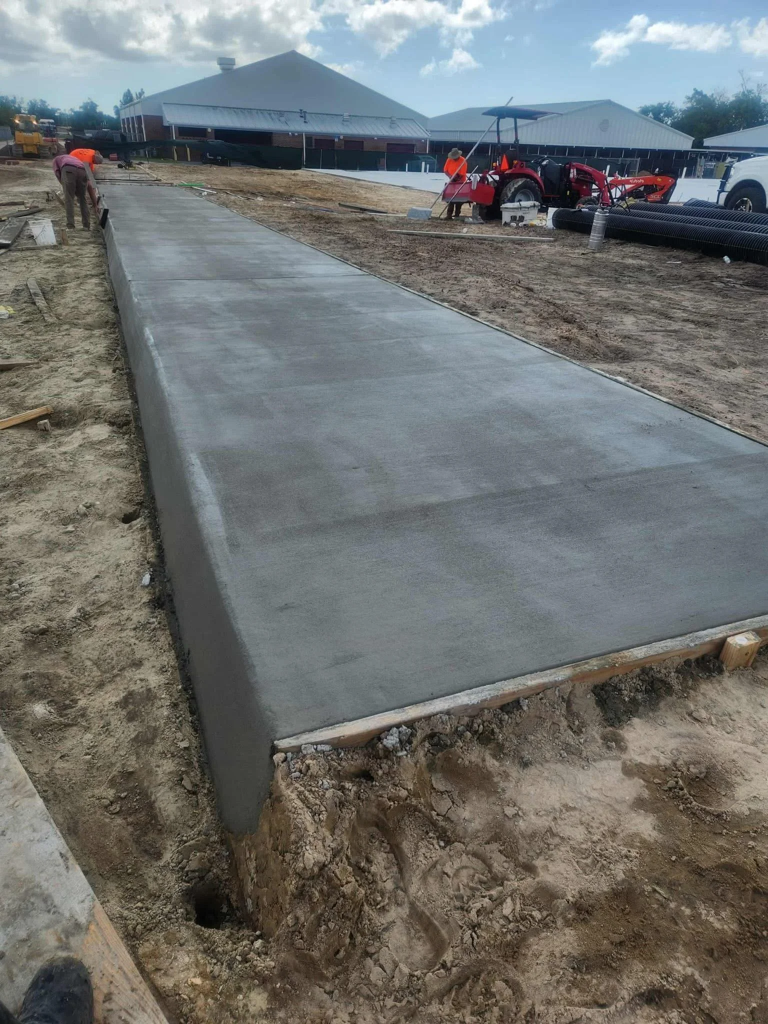 Freshly poured concrete sidewalk at Tyndall Airforce Base.