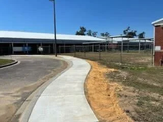 New sidewalk for local school.