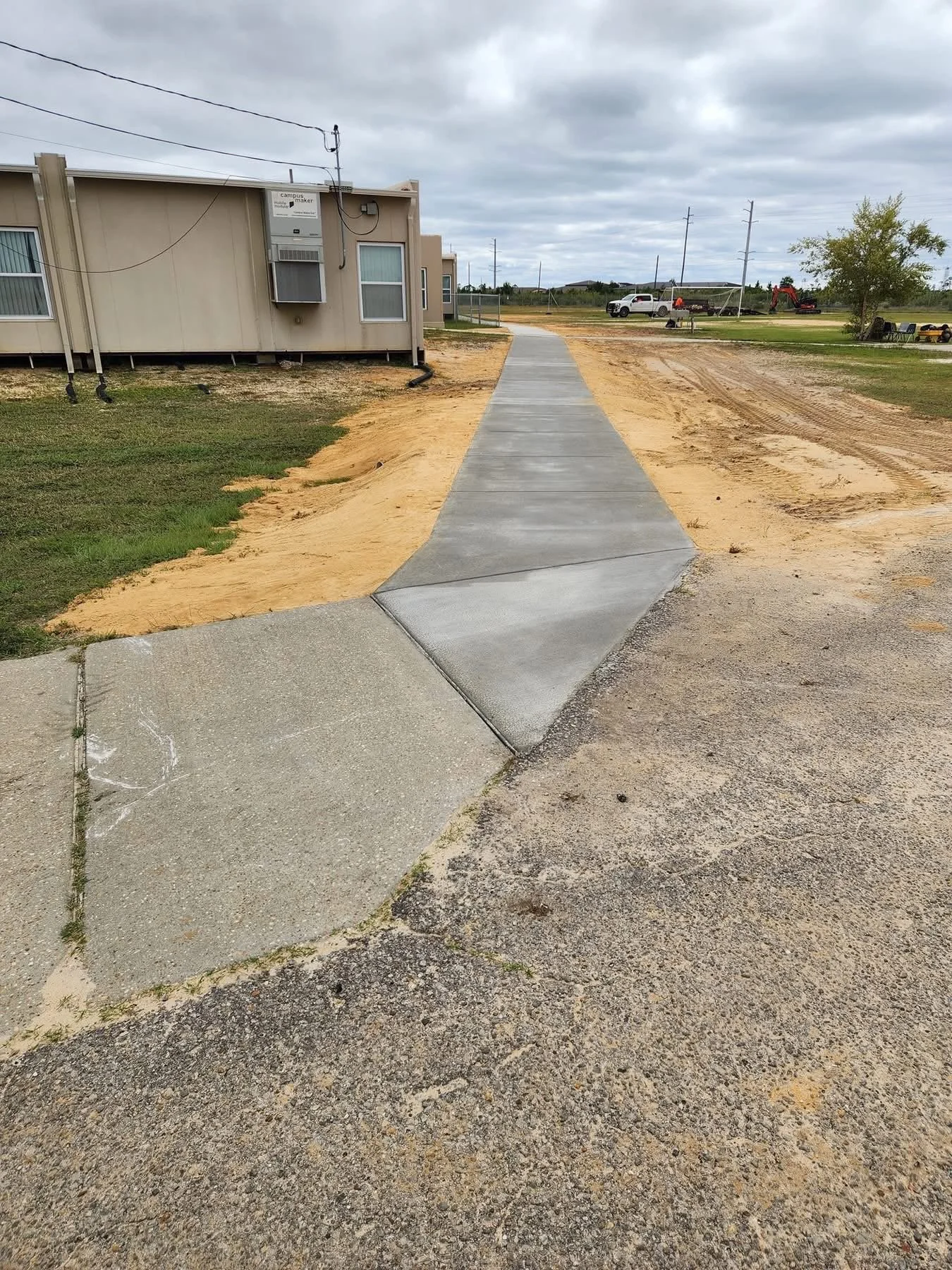 New concrete sidewalk.