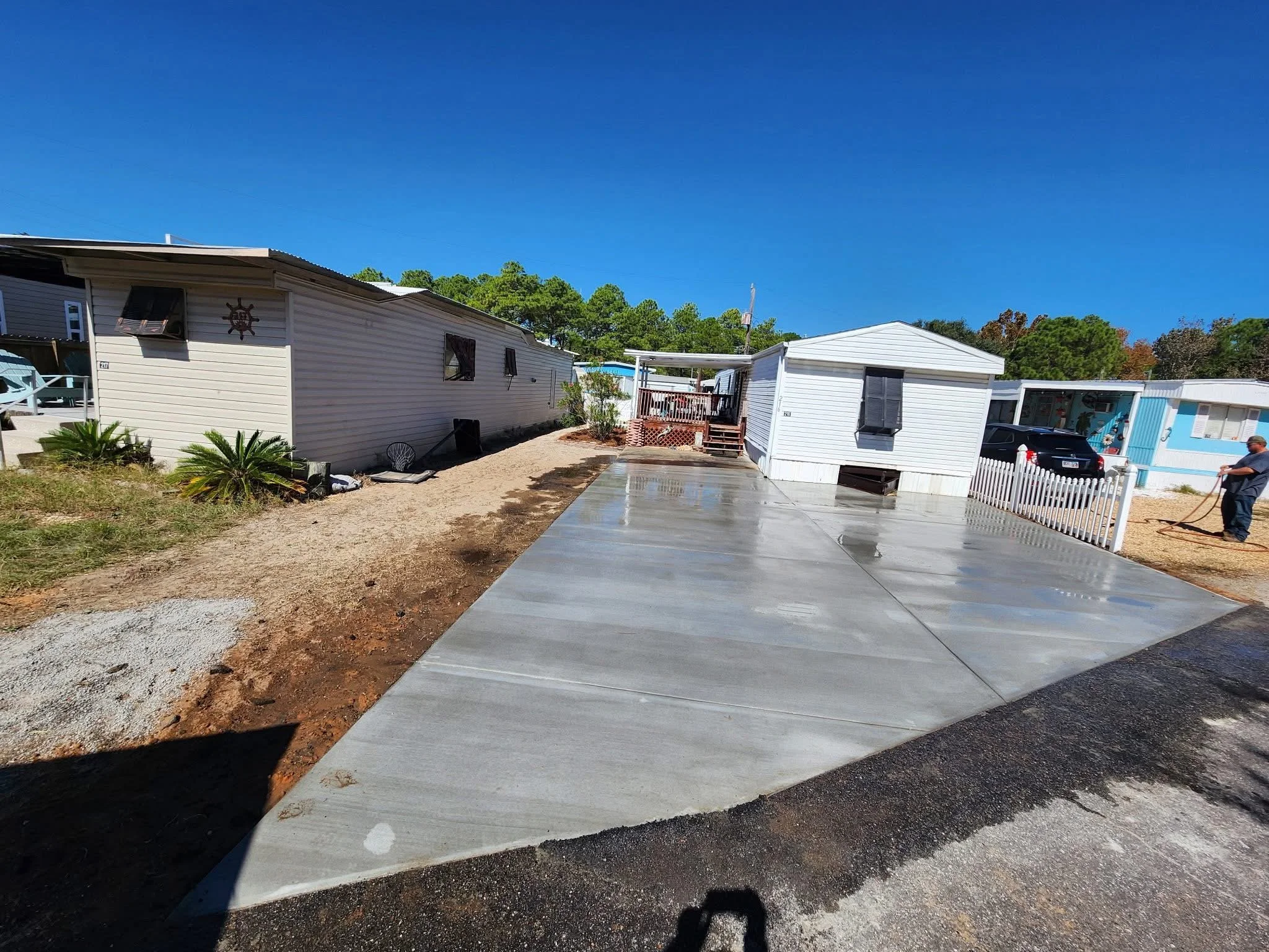 Freshly poured new concrete driveway for residential owner.