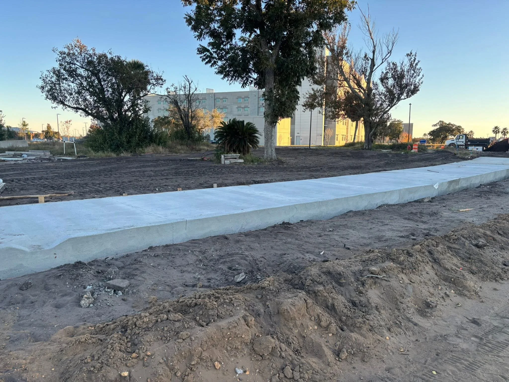 Construction site with freshly poured concrete sidewalk on Tyndall Airforce Base.
