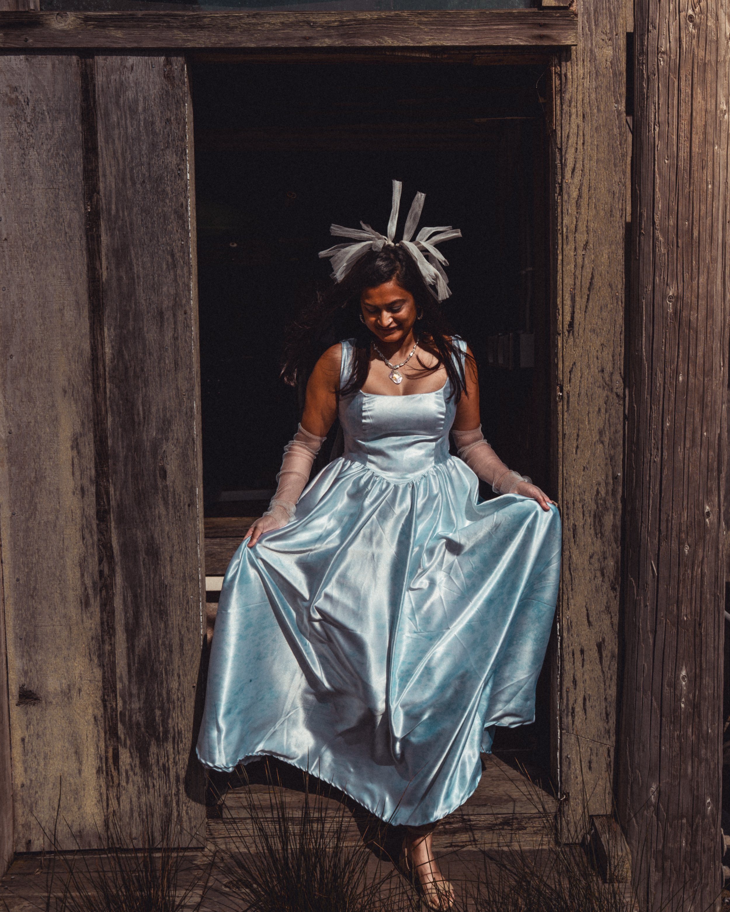 Cyanotype printed gown by Katie Erickson, pearl necklace by Erica Goodwin, pearl hoop earrings by Sitoë Thiam.
Photo by Jonathan Aguiñaga