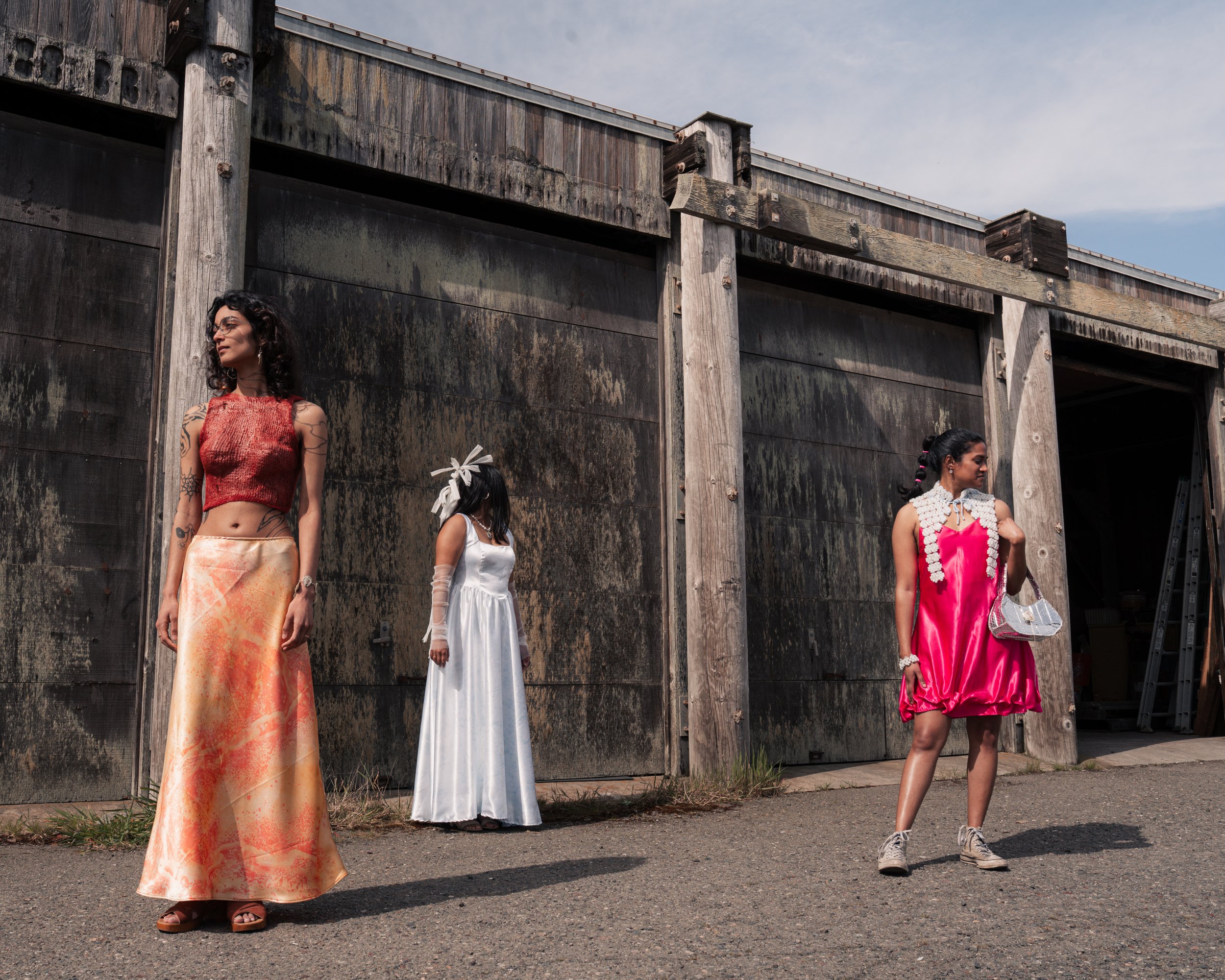 Left: Agar formed knit top by Erica Goodwin, cyanotype printed slip skirt by Katie Erickson and Erica Goodwin.
Center: Cyanotype printed gown by Katie Erickson, mesh headpiece and gloves by Sitoë Thiam.
Right: Bioball beaded collar, cuff, and ear