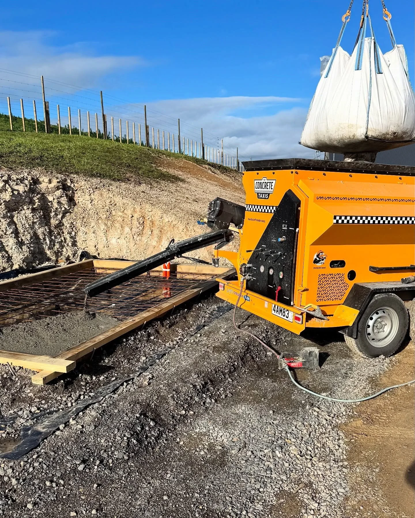 NZ Concrete Taxi pours small slab in rural location