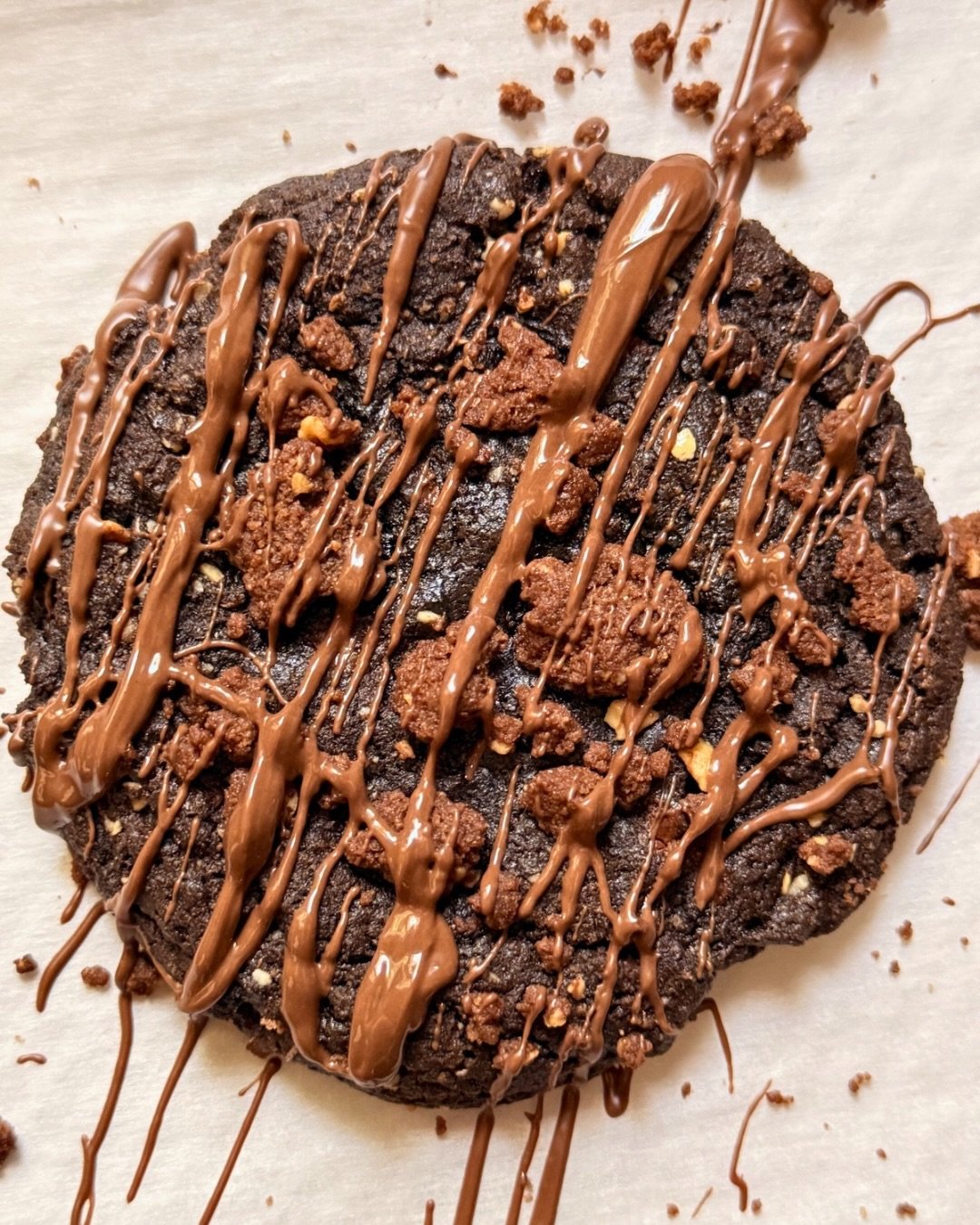 A moment for the drizzle 🥵 
Giving Ms. Rocher a run for her money.

No. 70 // Chocolate Hazelnut 
Black cocoa, Nutella, toasted hazelnut, and chocolate biscotti.

Chocolate fever dream 🍫🌰

#cookiesdefleur #madeindc #dcfood #microbakery