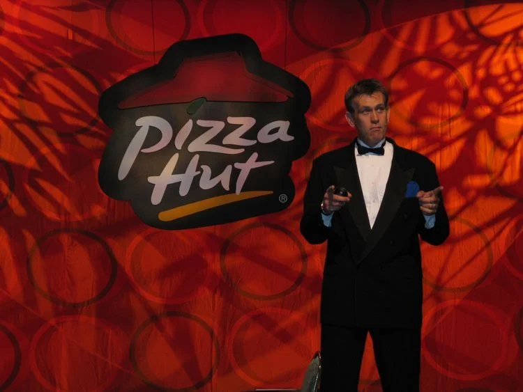 Mitch Mitchem facilitating a Pizza Hut RGM leadership meeting