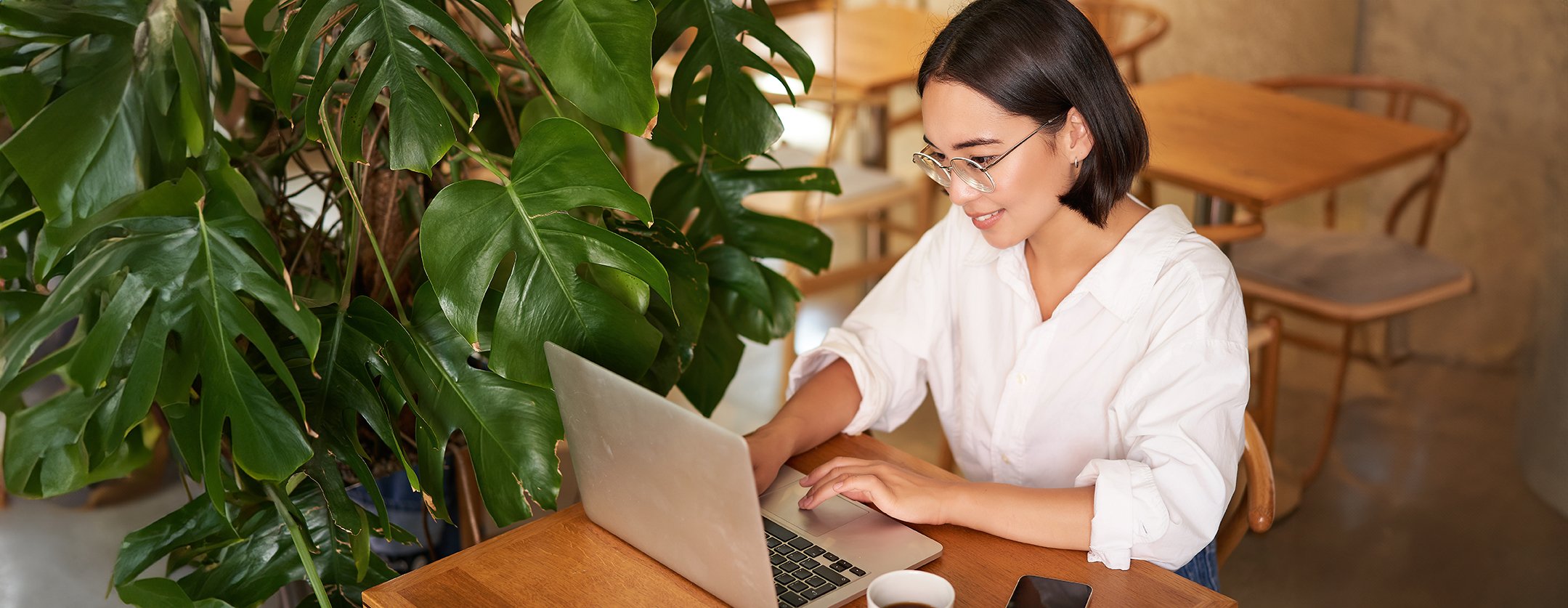 Business owner reviewing brand positioning with creative director