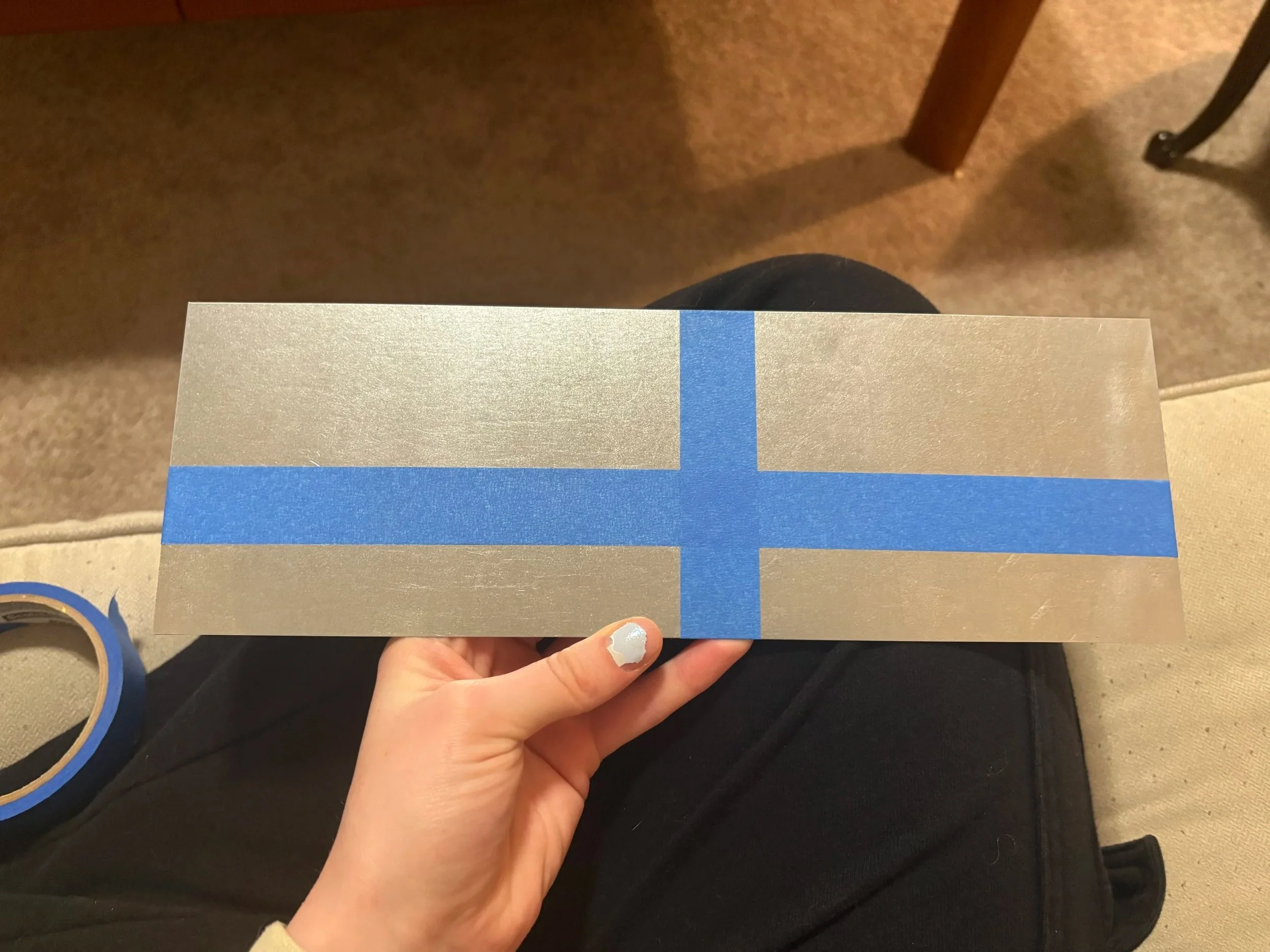 Step one of application: map the spacing with painter's tape.