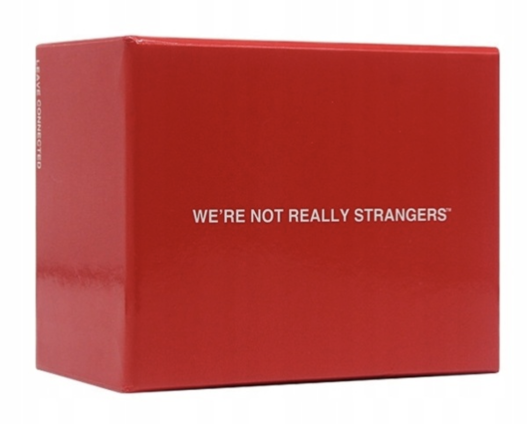 Red box with the phrase "WE'RE NOT REALLY STRANGERS" printed in white on the front.