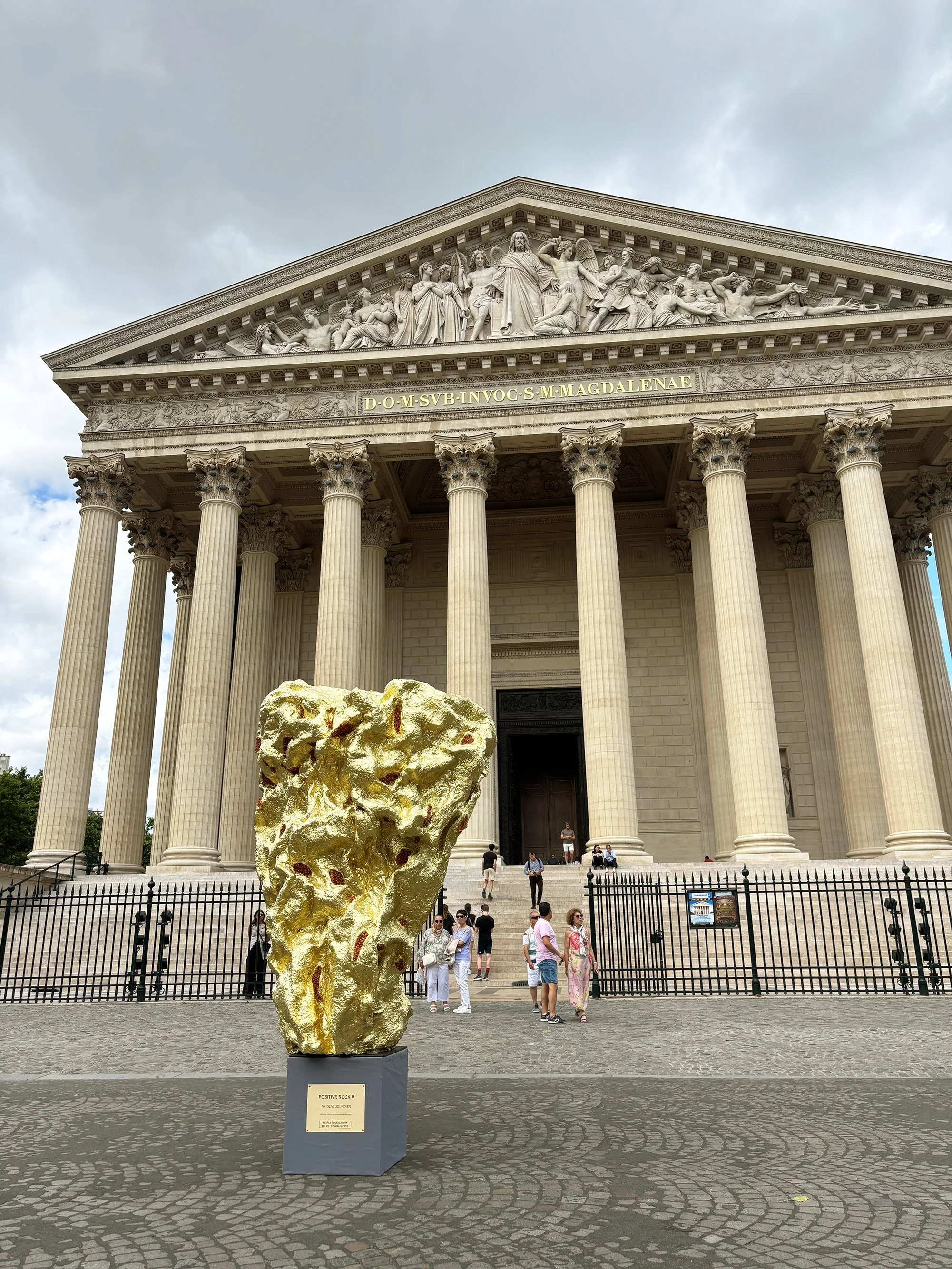 Large sculpture made of bronze, baltic amber and solid gold, located Place de la Madeleine in Paris