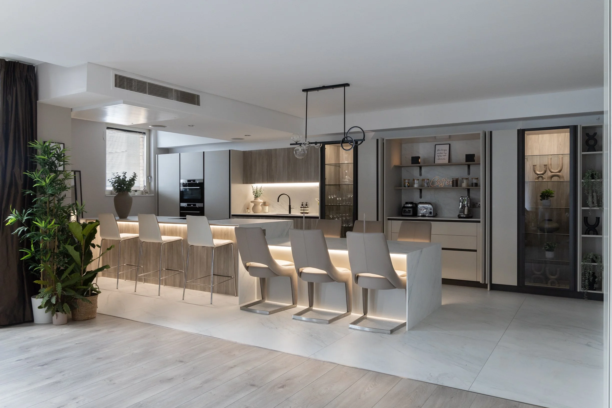 Luxury Manchester Penthouse kitchen. Multi-height kitchen island. Full fitted luxury kitchen