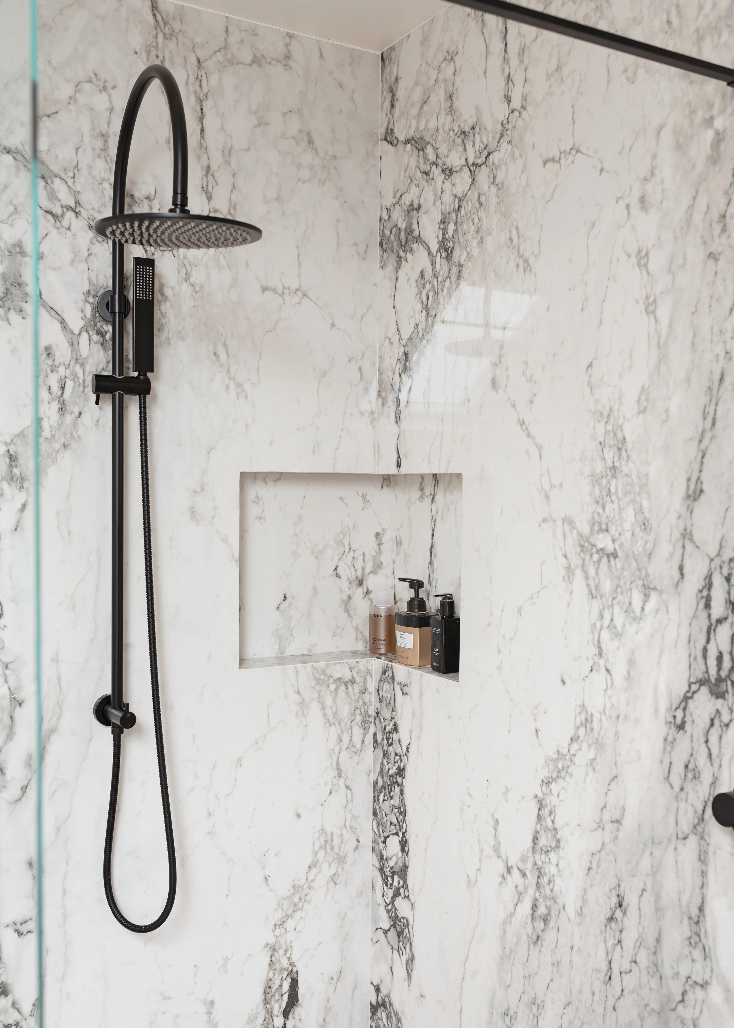 Guest ensuite. Large format tiles. Bespoke vanity. Bespoke basin, Walk in shower. Wall mounted taps.