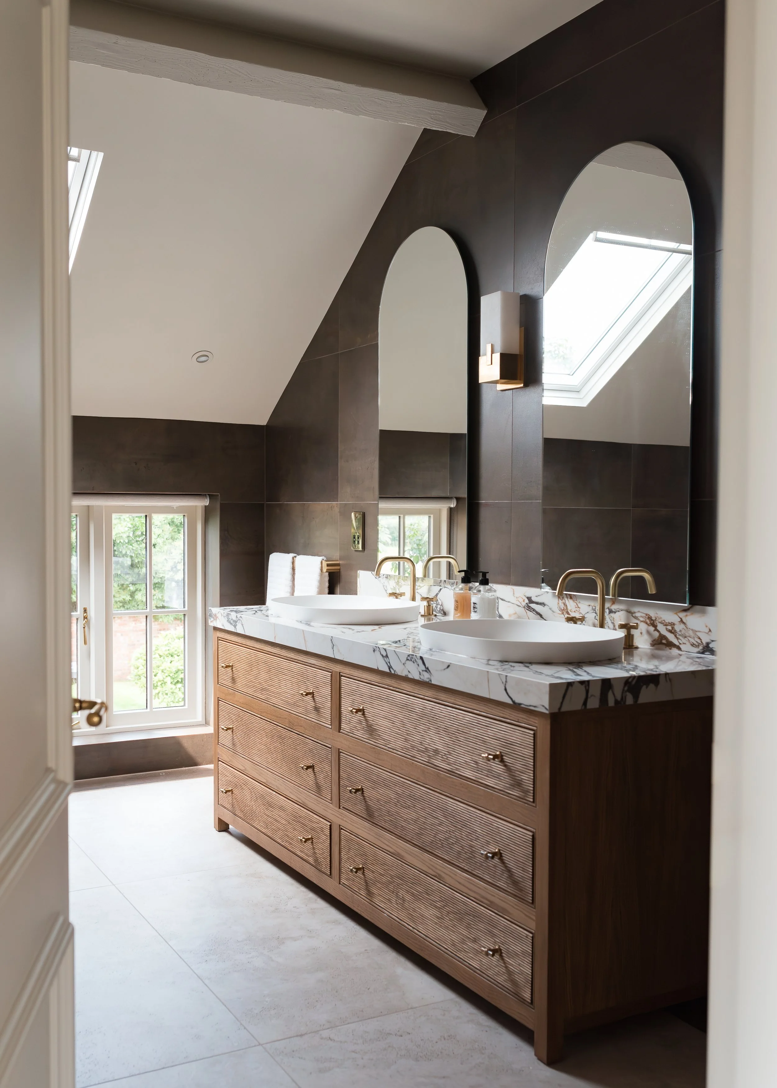 Master ensuite. Double vanity. Bespoke vanity top. Double basins. Large format tiles. Double shower. Recessed, mitred shelves. Flowing shelves. Bespoke shower glass.
