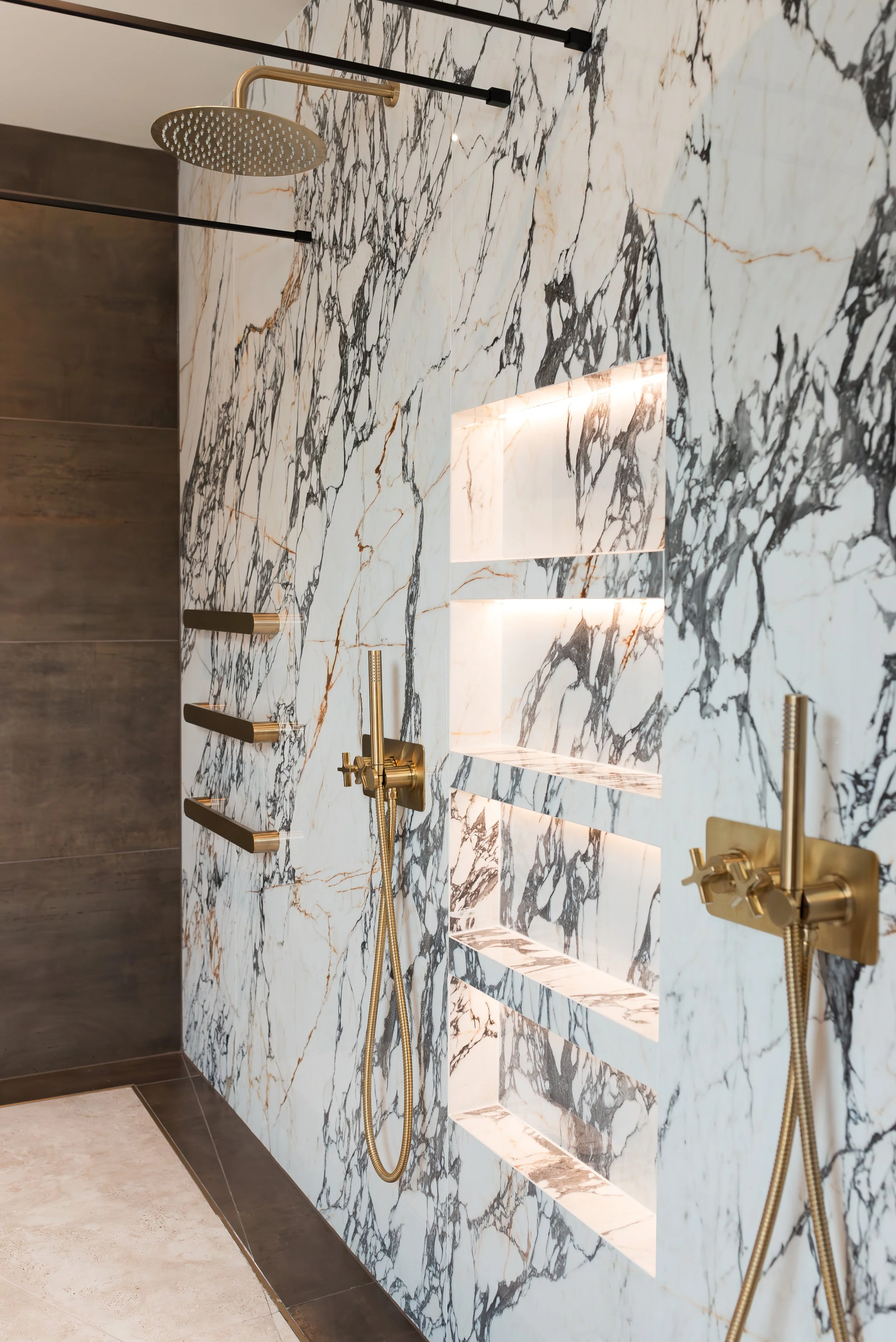 Master ensuite. Double vanity. Bespoke vanity top. Double basins. Large format tiles. Double shower. Recessed, mitred shelves. Flowing shelves. Bespoke shower glass.