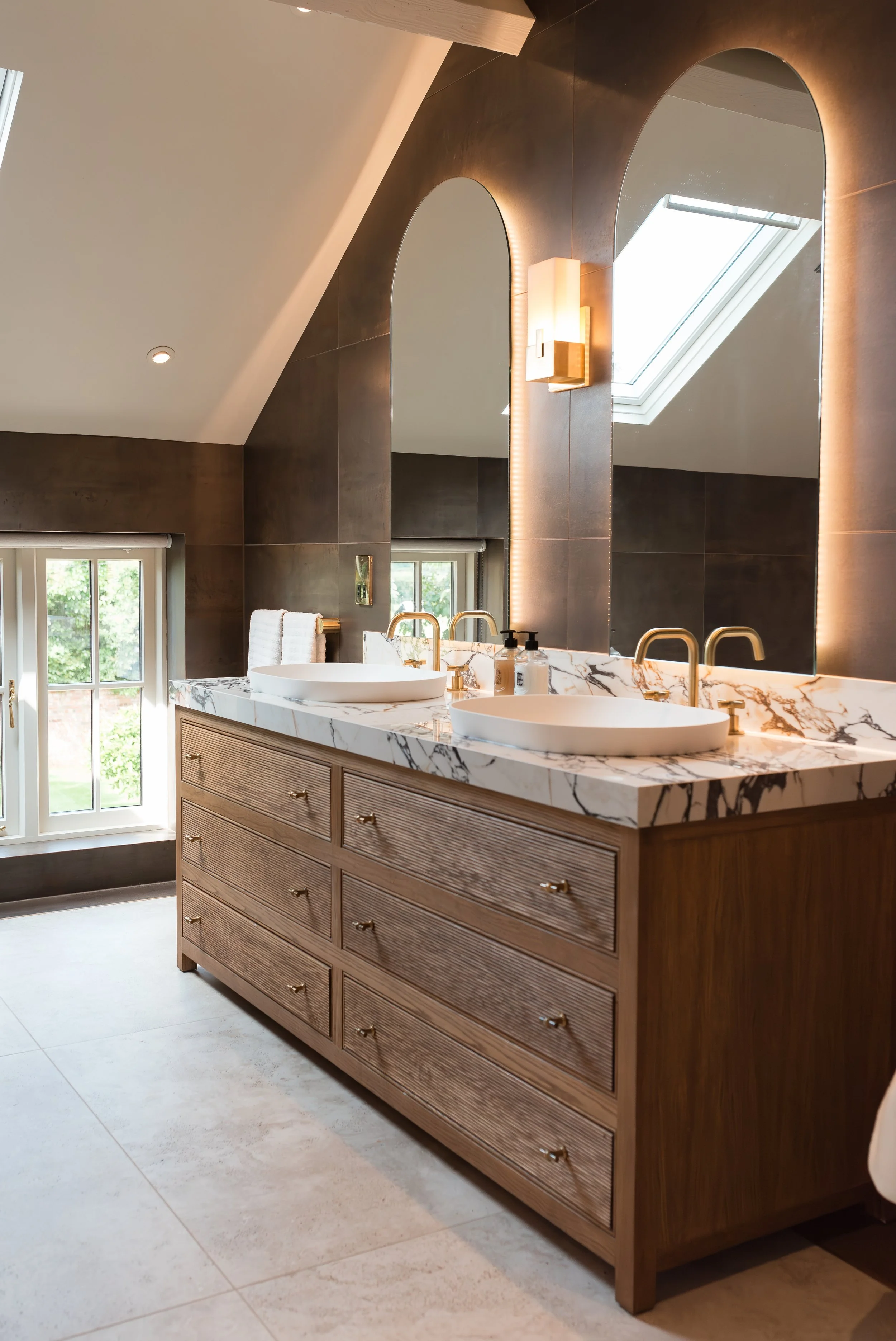 Master ensuite. Double vanity. Bespoke vanity top. Double basins. Large format tiles. Double shower. Recessed, mitred shelves. Flowing shelves. Bespoke shower glass.
