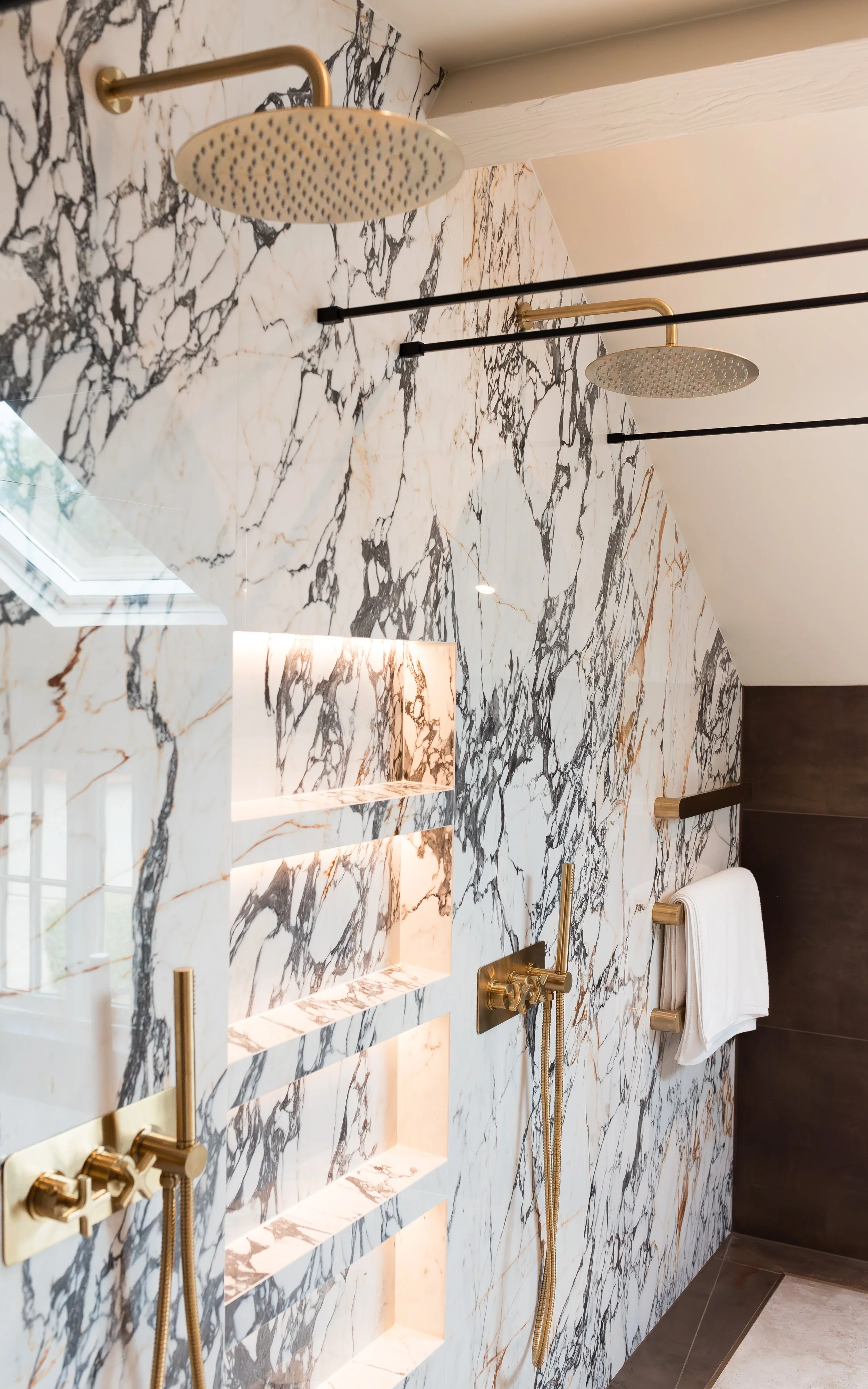 Master ensuite. Double vanity. Bespoke vanity top. Double basins. Large format tiles. Double shower. Recessed, mitred shelves. Flowing shelves. Bespoke shower glass.