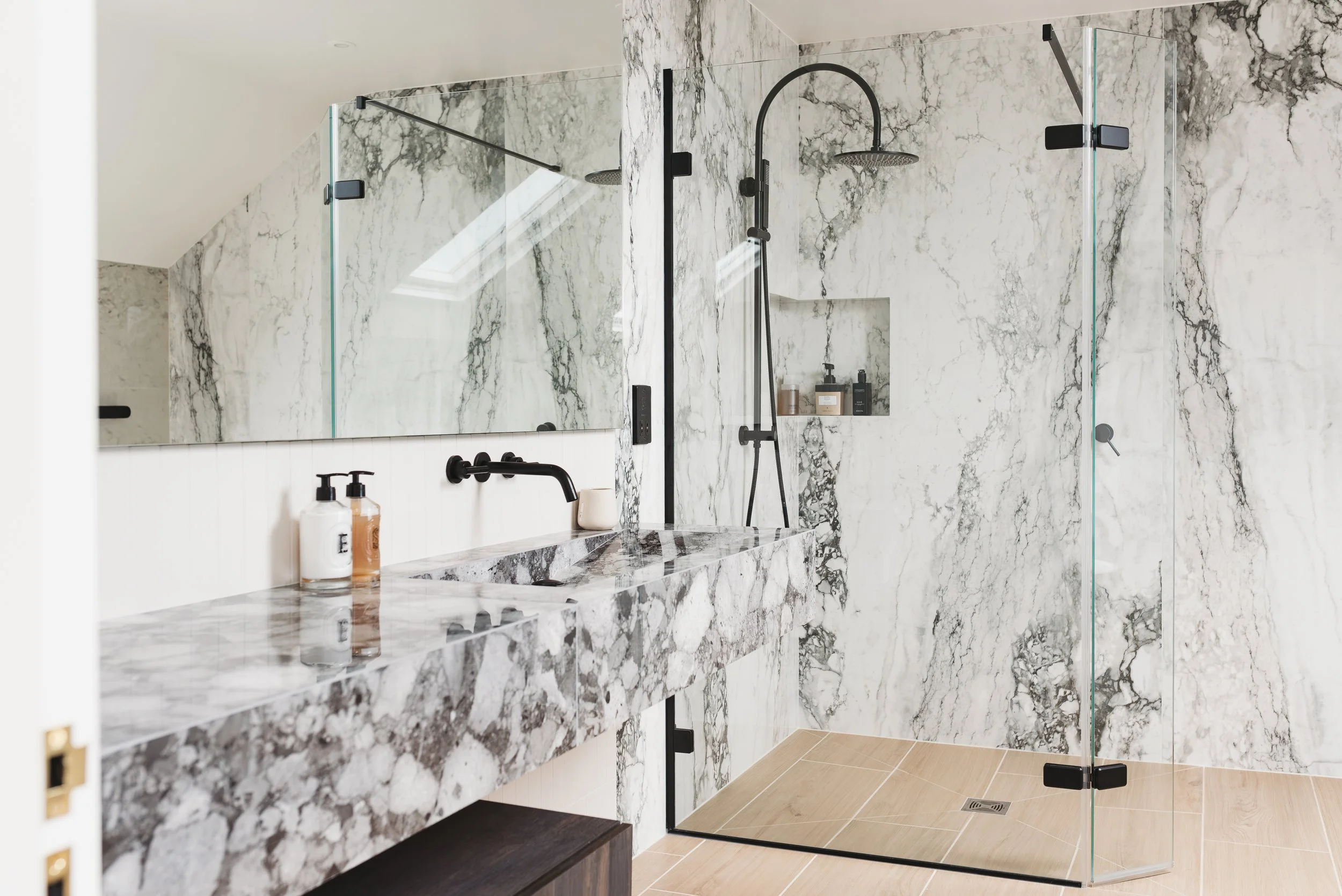Guest ensuite. Large format tiles. Bespoke vanity. Bespoke basin, Walk in shower. Wall mounted taps.