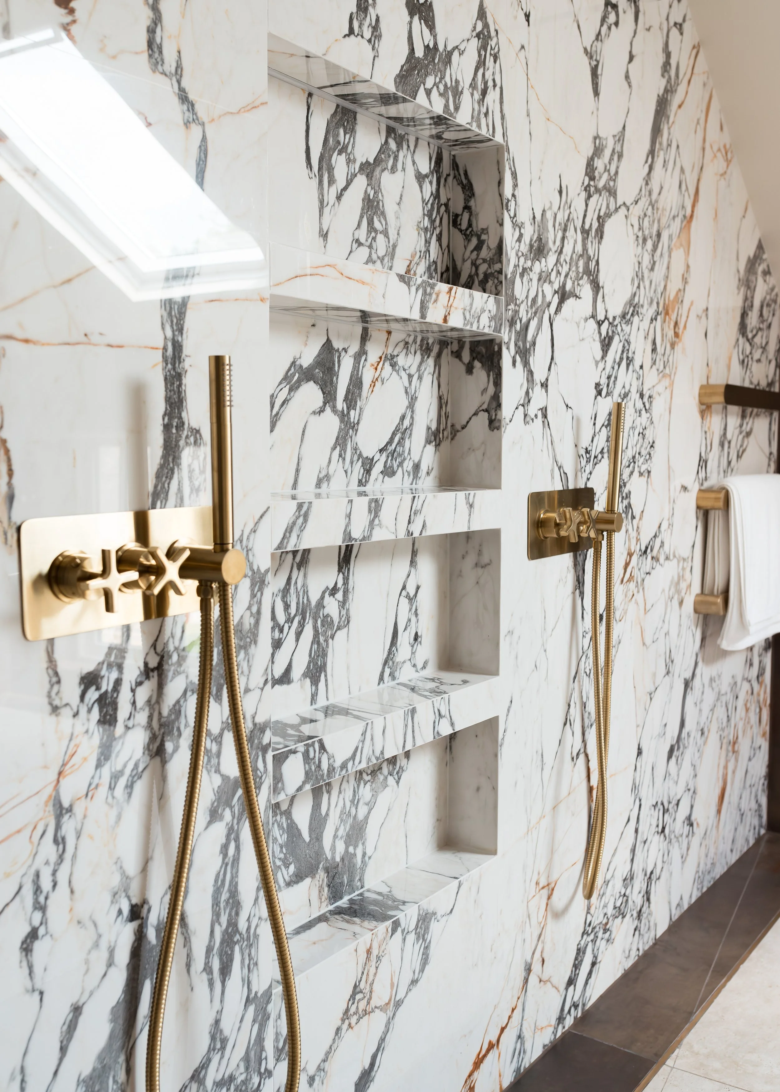 Master ensuite. Double vanity. Bespoke vanity top. Double basins. Large format tiles. Double shower. Recessed, mitred shelves. Flowing shelves. Bespoke shower glass.