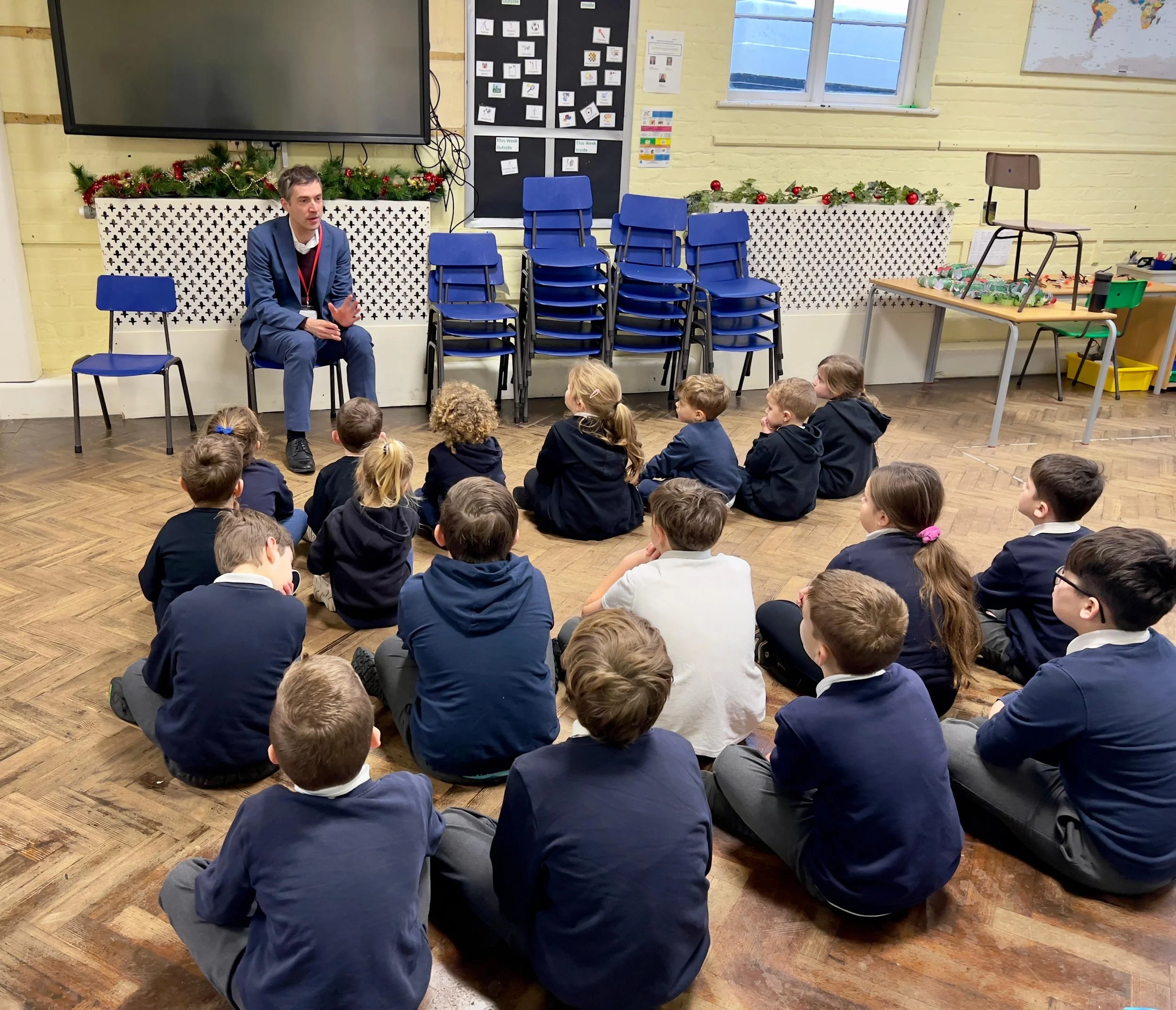 In Tivetshall Primary School, chatting with teachers and pupils.