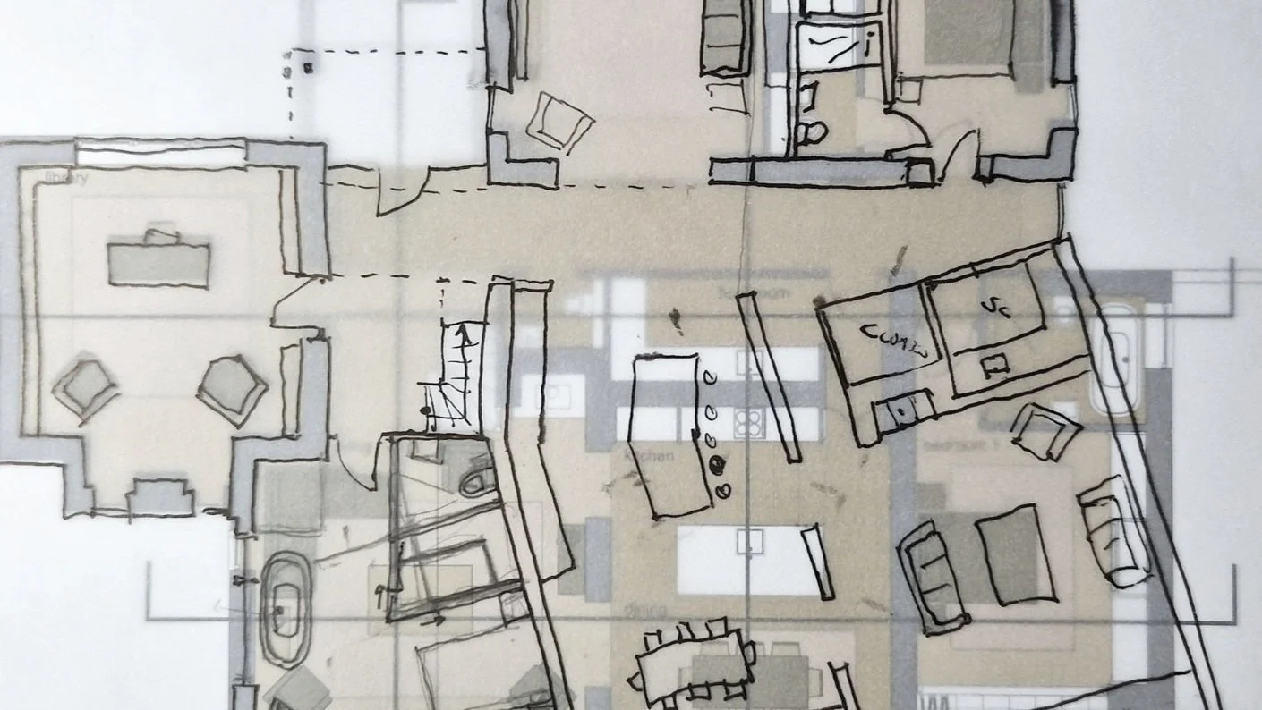 Architectural floor plan sketch with multiple rooms, furniture layouts, and annotations.