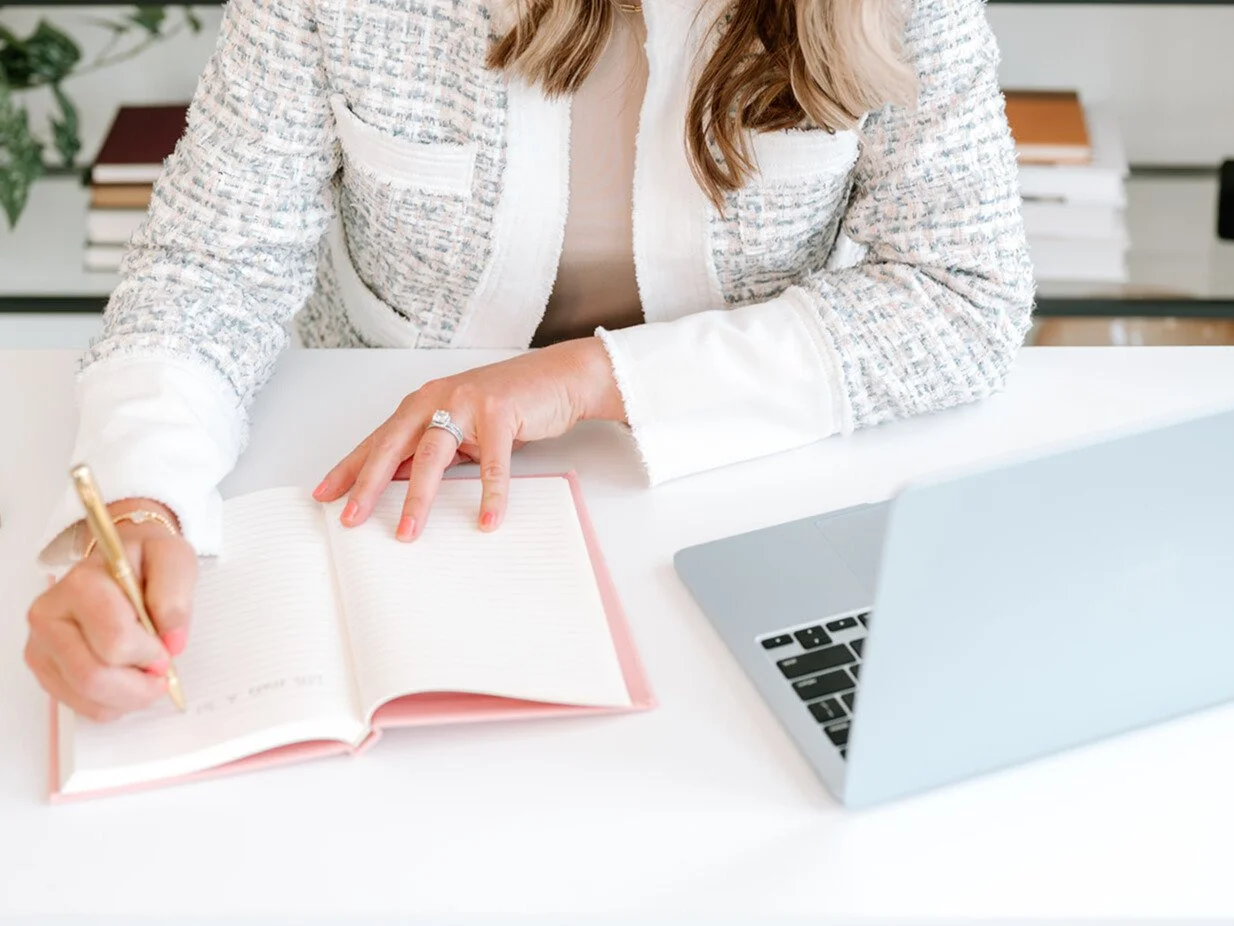 alt="Green plant in teal pot adding calm workspace design to LaunchPoint Talent setting"