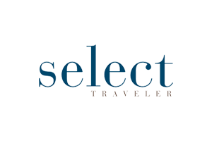 Select Traveler logo in blue and gold text.