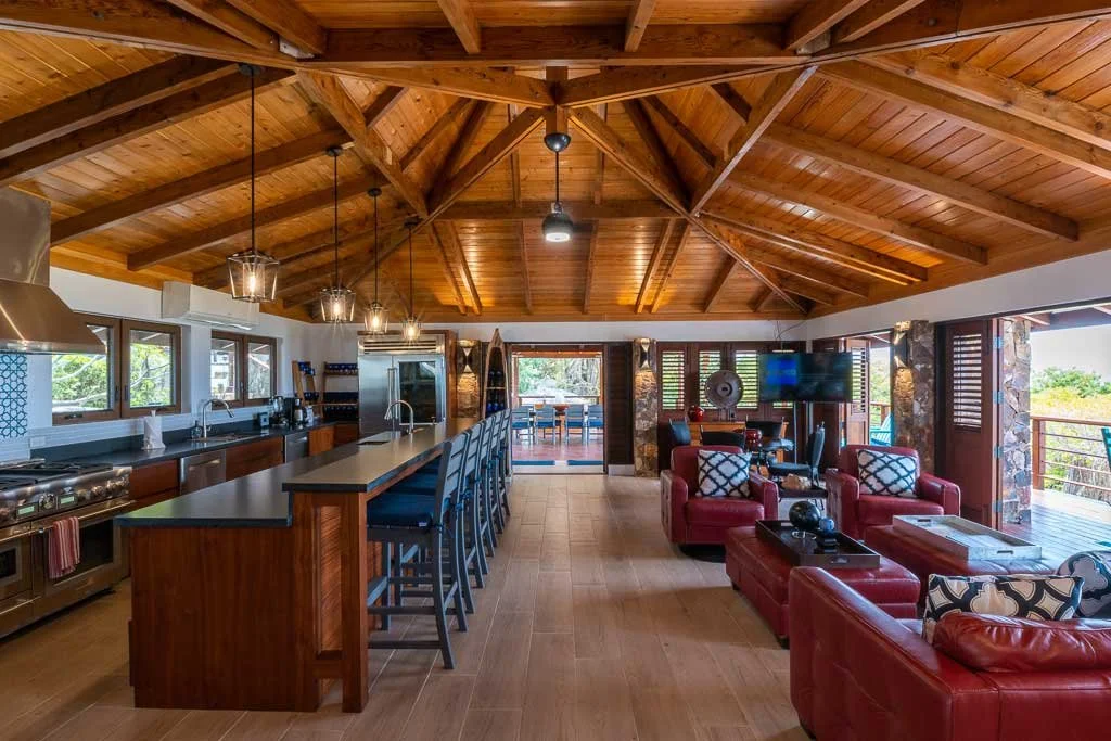Open kitchen and living room at Eden Waters Villa in Little Trunk Bay