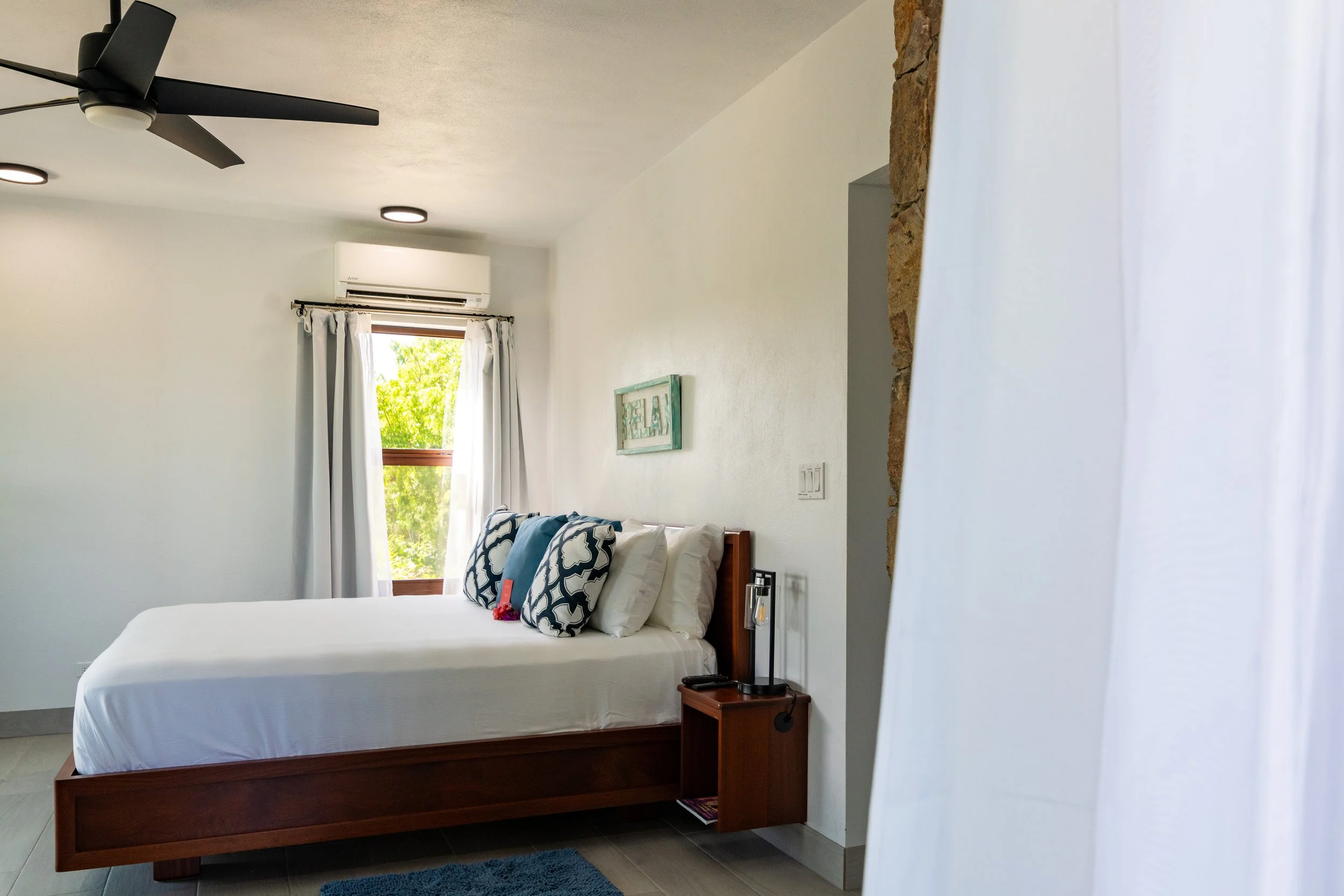 Private king suite with en-suite bathroom at Eden Waters Villa