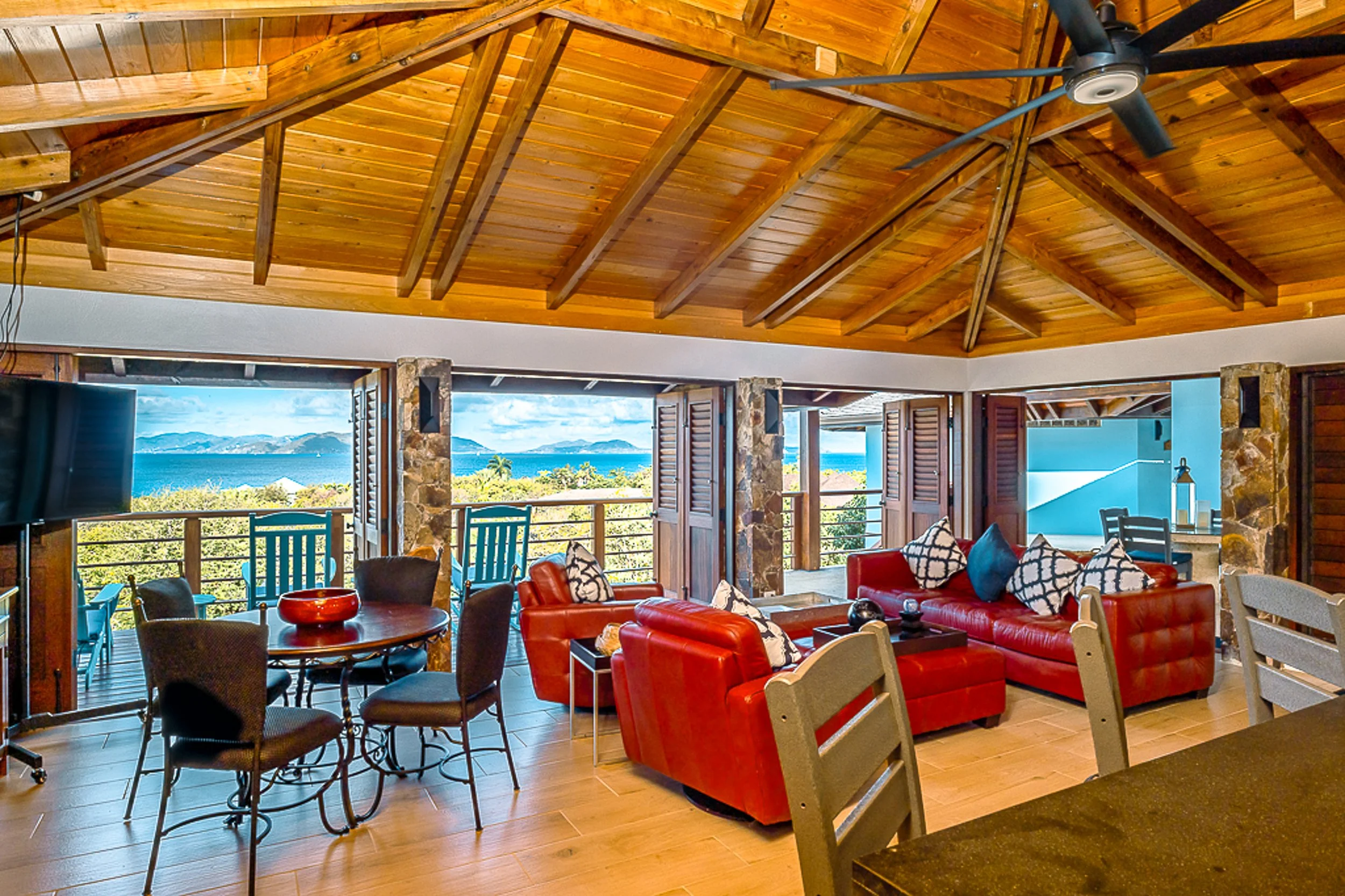 Open kitchen and living room at Eden Waters Villa in Little Trunk Bay